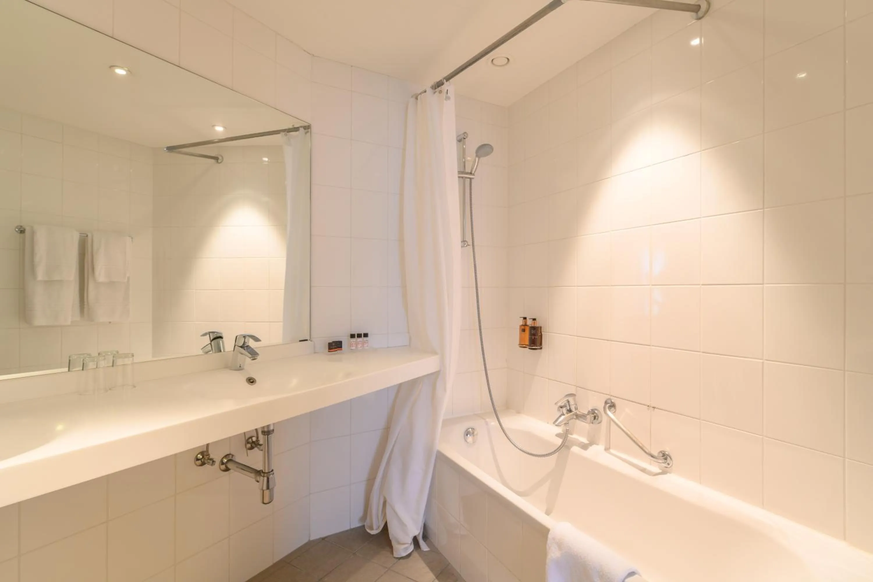 Bathroom in ALMA Grand Place Hotel