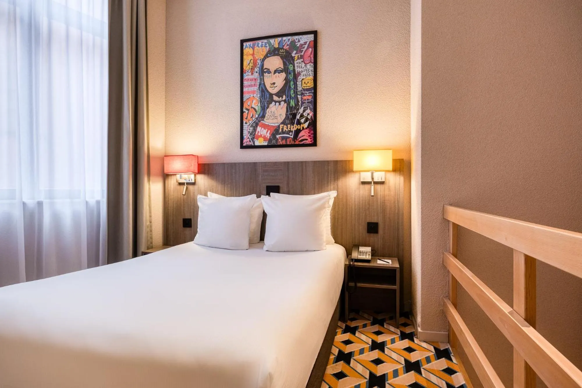 Bed in ALMA Grand Place Hotel