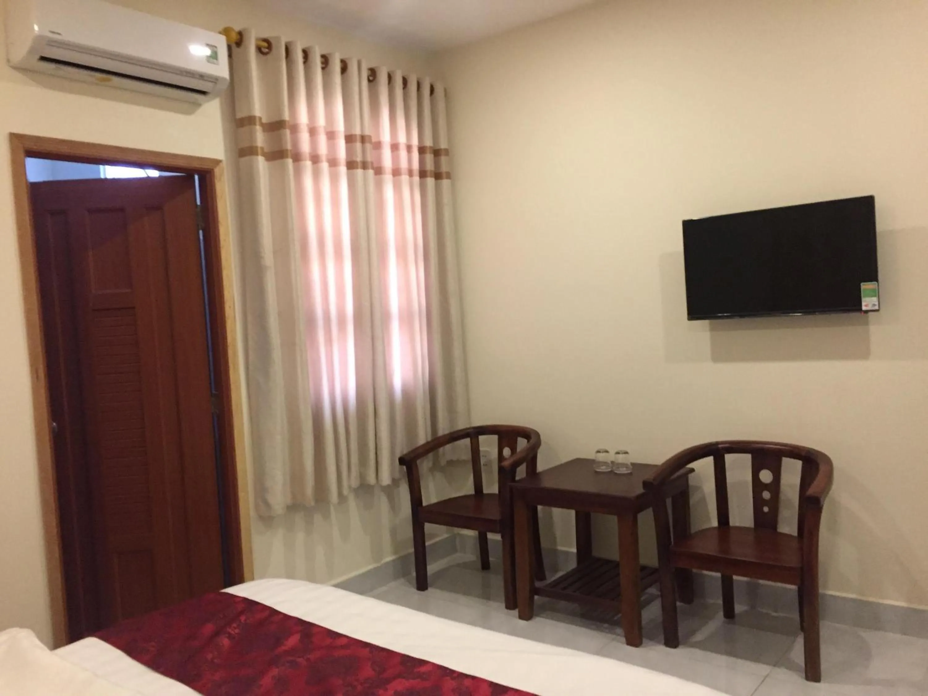 TV and multimedia, Bed in Huy Hoang 1 Hotel - Tân Bình