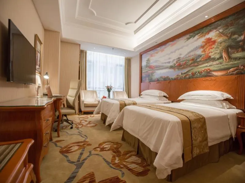 Bed in Vienna International Hotel Xi'an Hancheng Lake