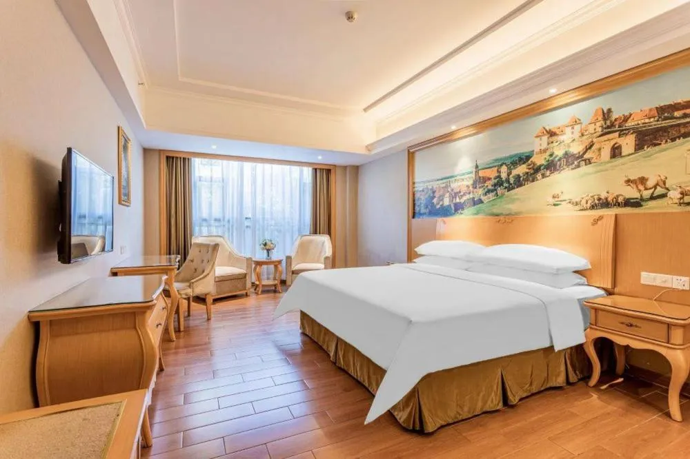 Bed in Vienna Hotel Foshan Airport