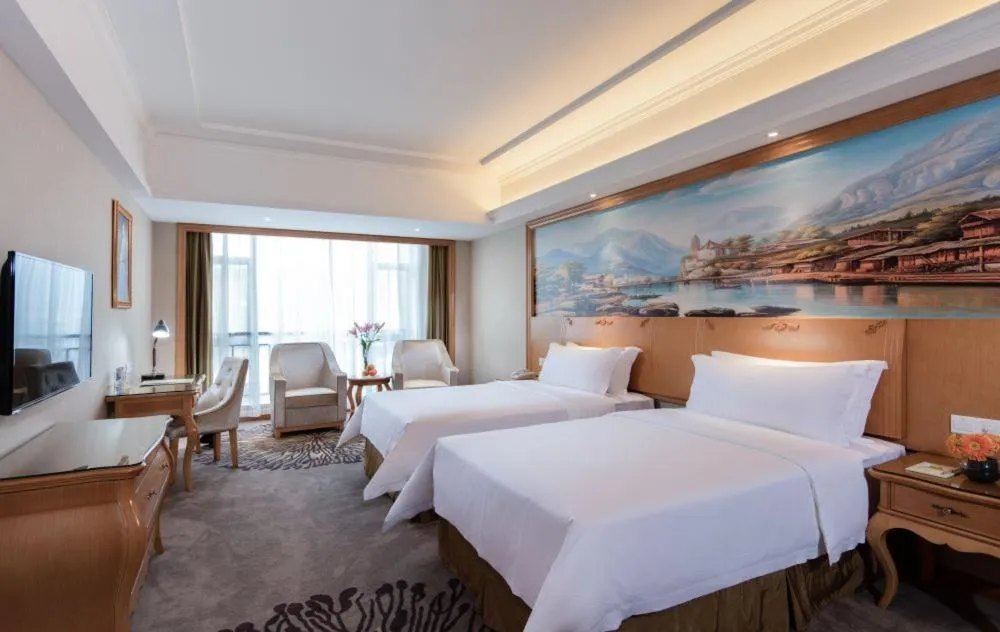 Bed in Vienna Hotel Foshan Airport