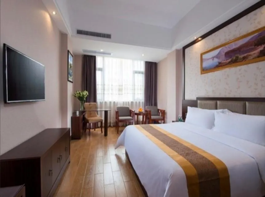 Bed in Vienna International Hotel Jieyang Chaoshan Airport