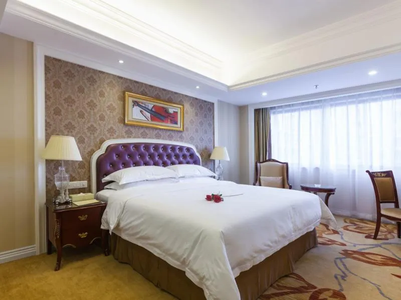 Bed in Vienna International Hotel Nanning Zoo