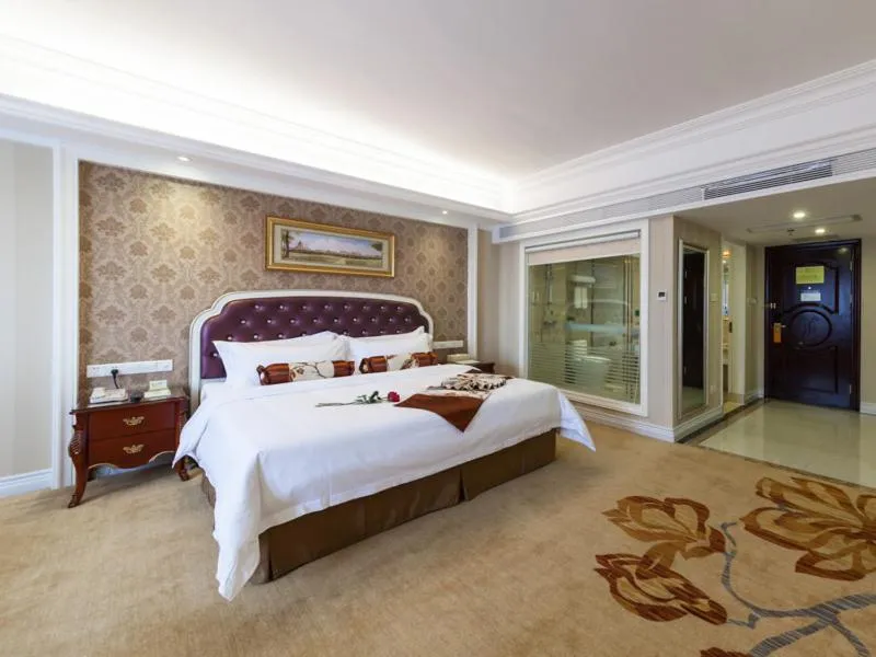 Bed in Vienna International Hotel Nanning Zoo