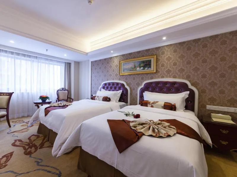 Bed in Vienna International Hotel Nanning Zoo