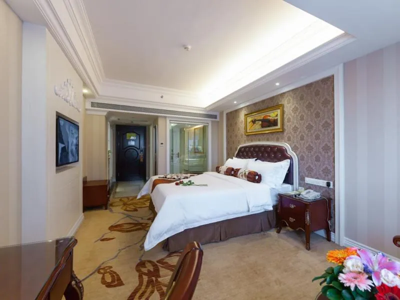 Bed in Vienna International Hotel Nanning Zoo