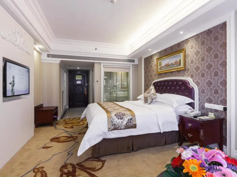 Bed in Vienna International Hotel Nanning Zoo