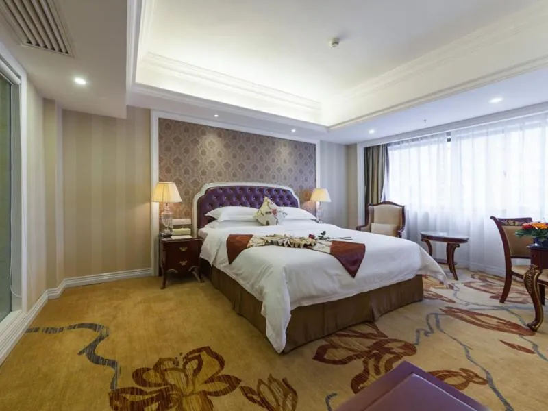 Bed in Vienna International Hotel Nanning Zoo