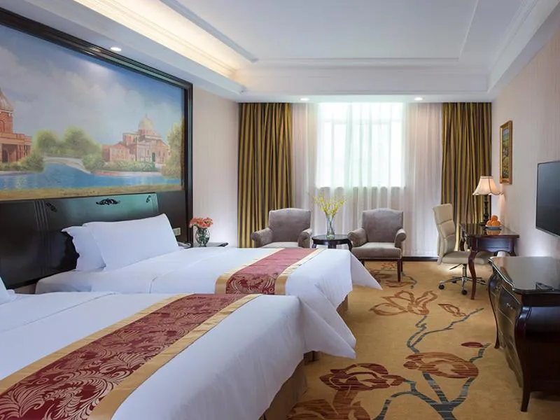Bed in Vienna International Hotel Shenzhen South Huanguan Road