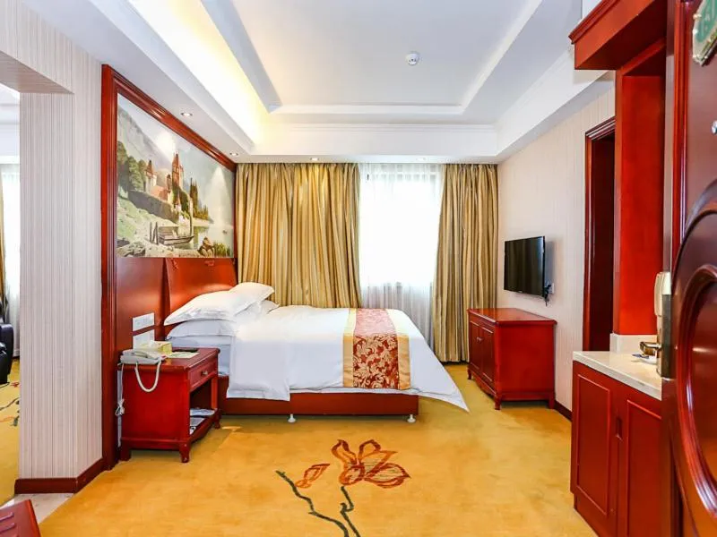 Bed in Vienna International Hotel Shanghai Fengxian Nanqiao