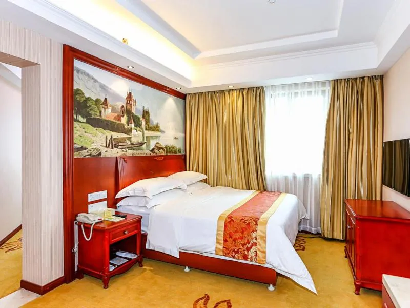 Bed in Vienna International Hotel Shanghai Fengxian Nanqiao