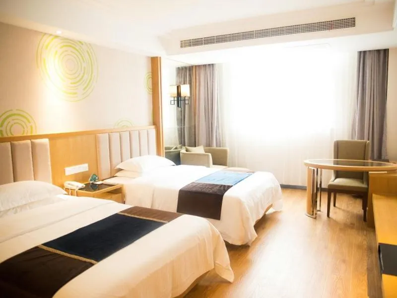 Bed in GreenTree Inn JiangSu Taizhou Taixing Middle Guoqing Road Business Hotel