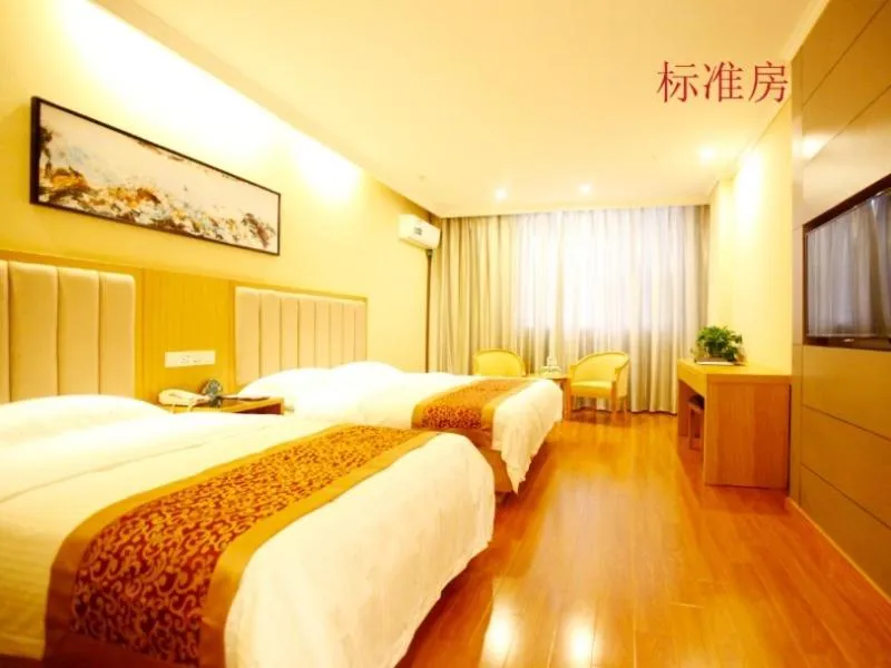 Bed in GreenTree Inn Jiangsu Yancheng Dongtai Huiyang Road Guofu Business Hotel