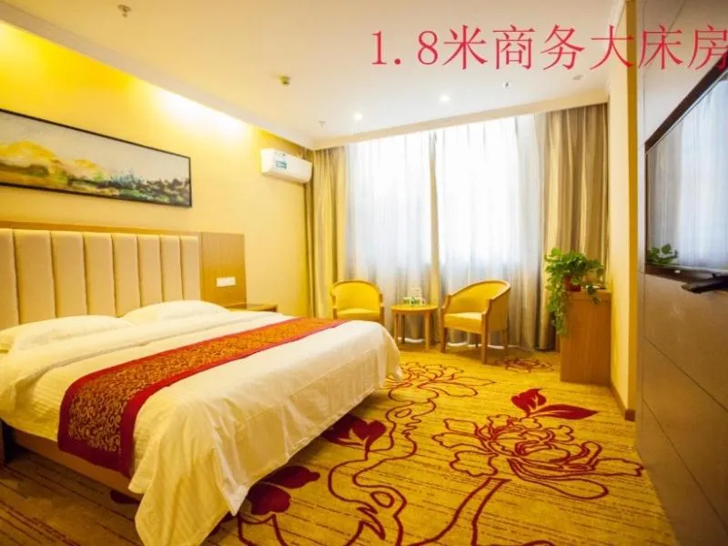Bed in GreenTree Inn Jiangsu Yancheng Dongtai Huiyang Road Guofu Business Hotel
