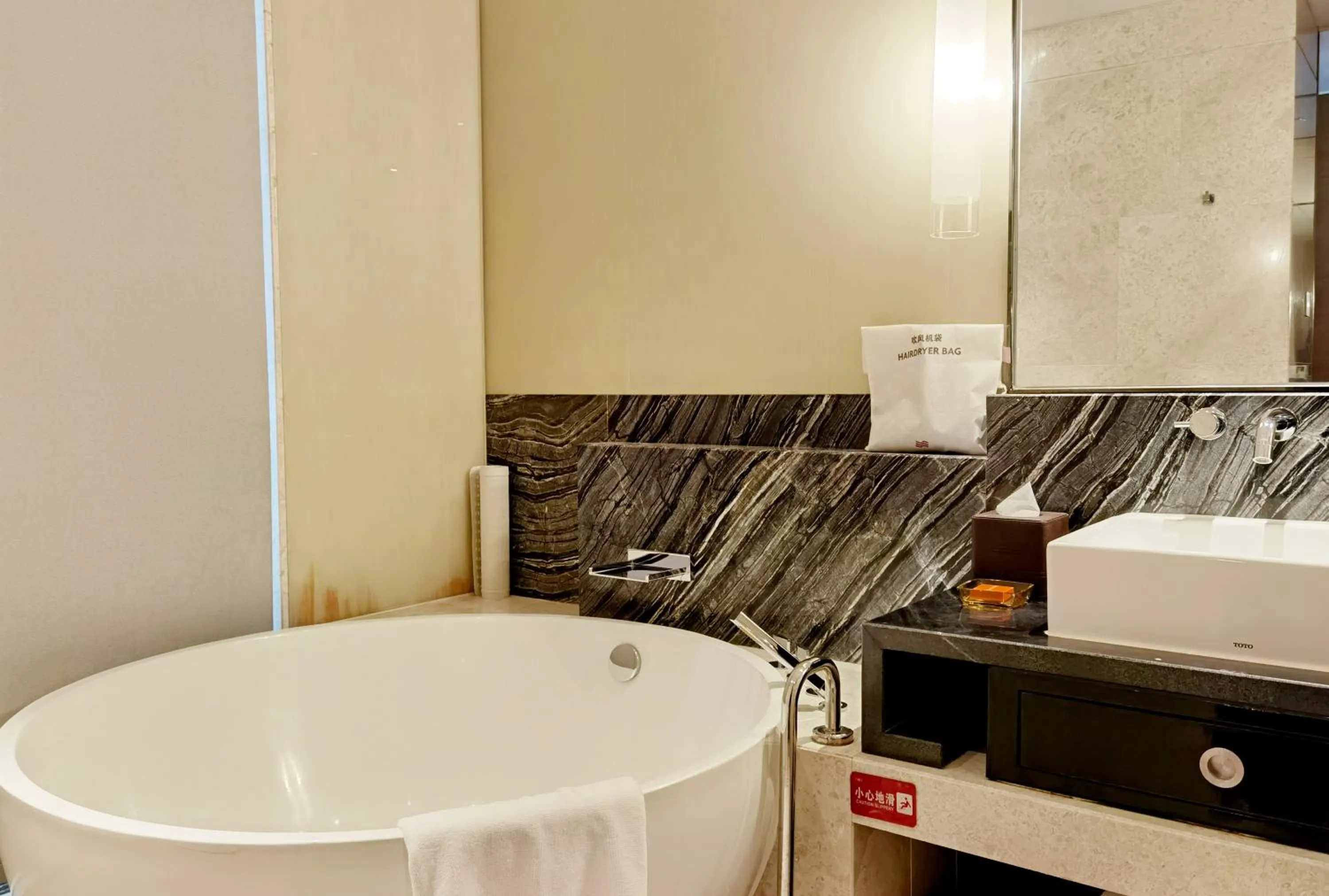 Bathroom in Crowne Plaza Chengdu Wenjiang by IHG