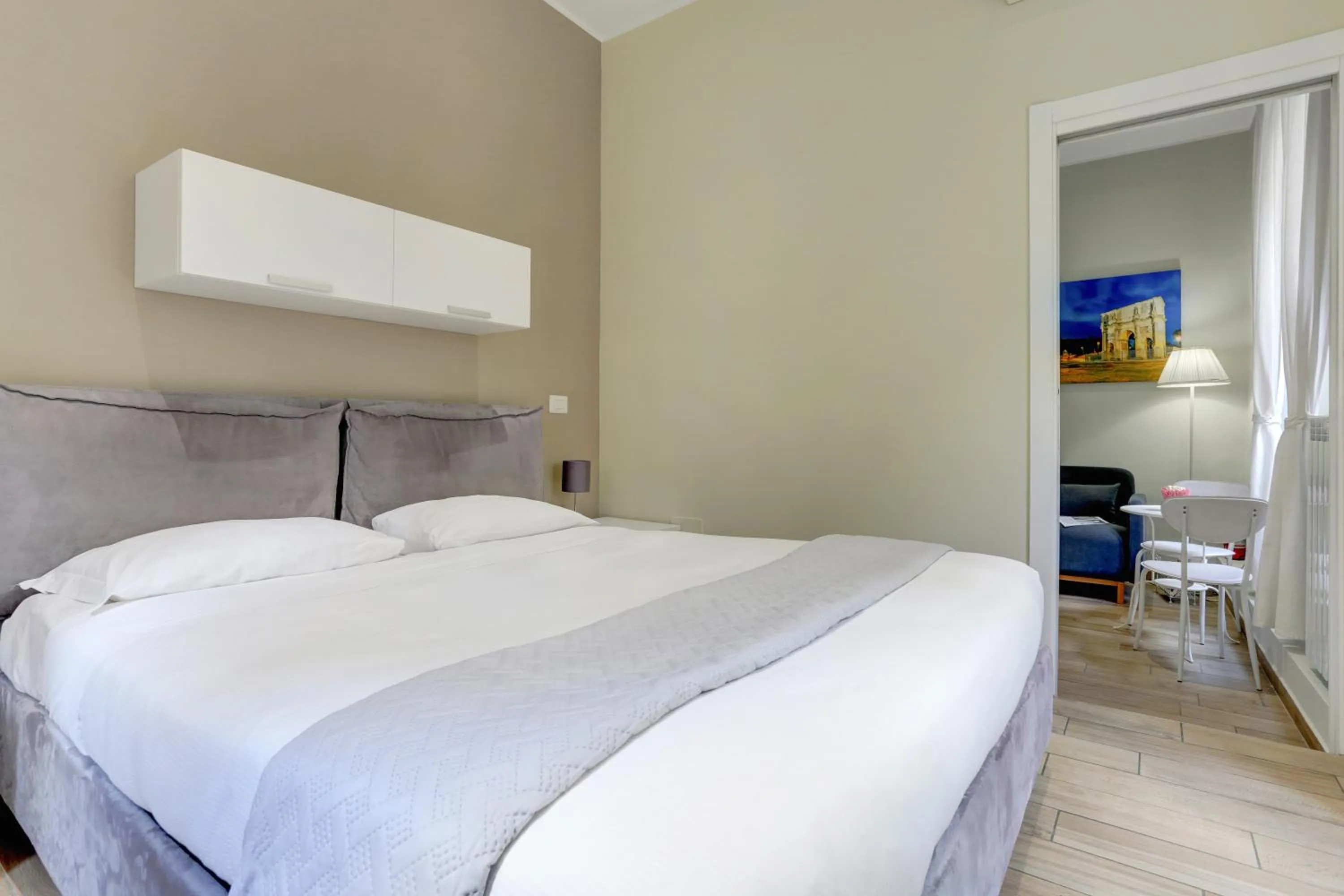 Bedroom, Bed in Appartamento Santi Quattro - Colosseo