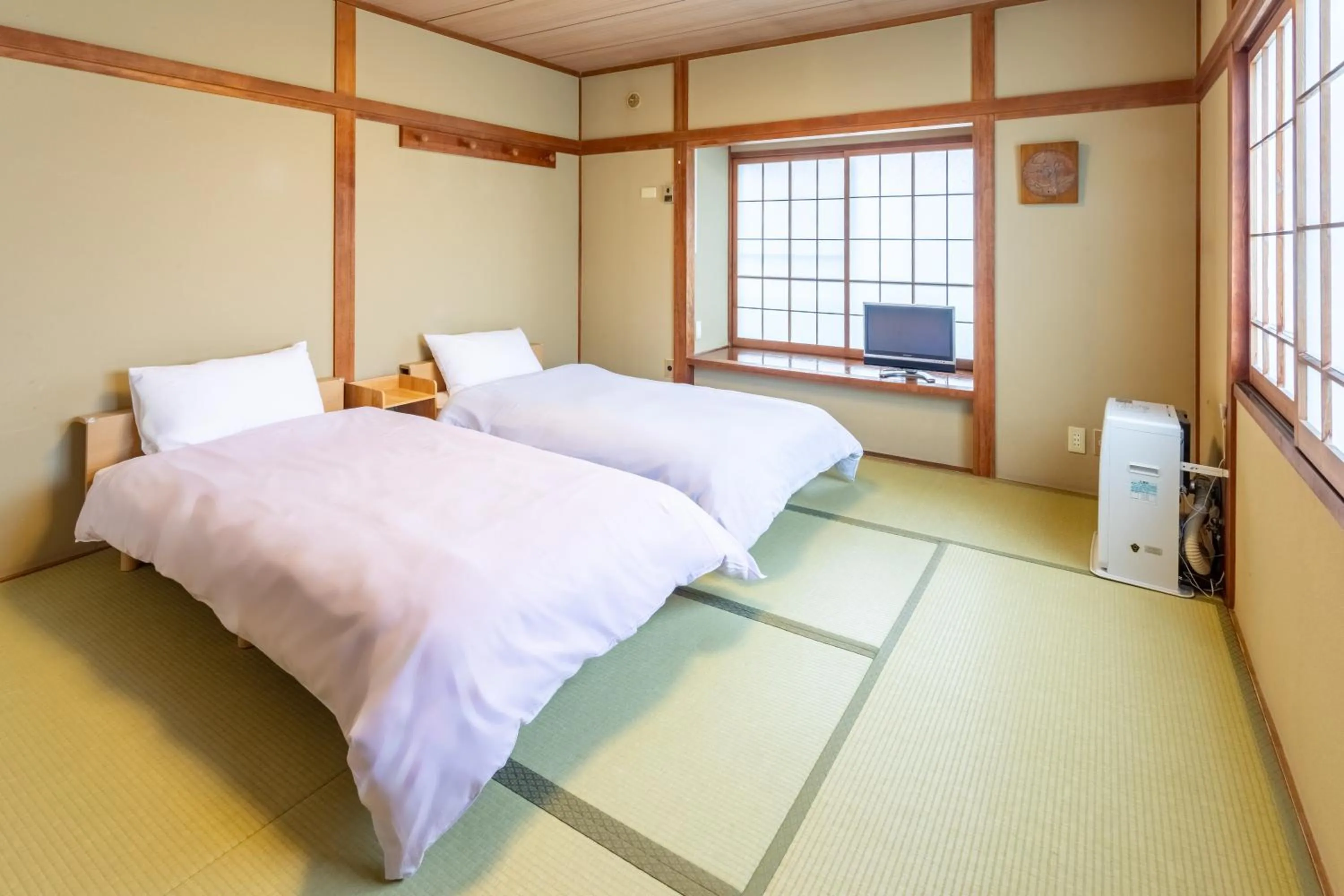 Bed in Pension Eastmountain Hakuba