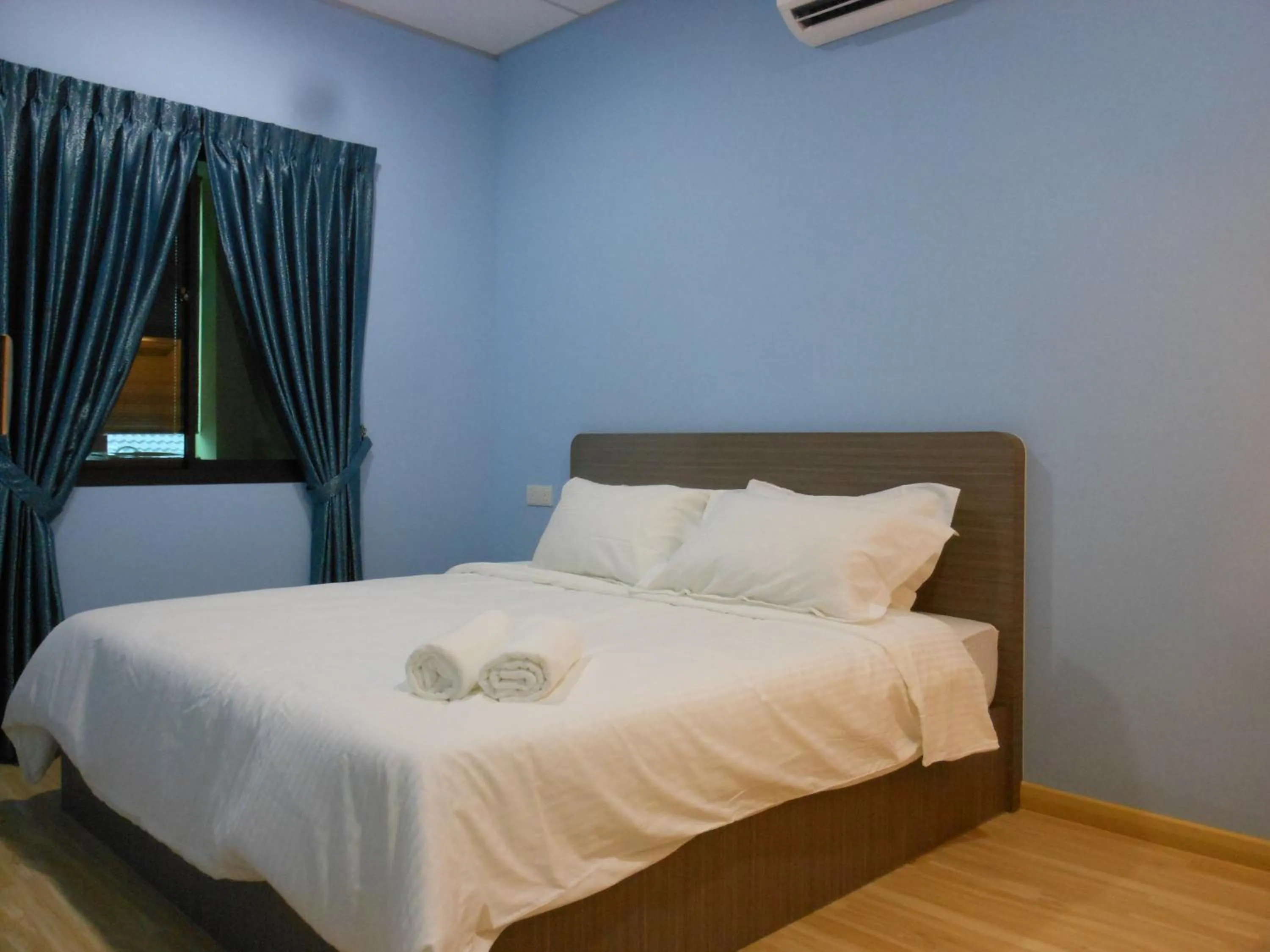 Bed in Eiman Homestay, Kluang