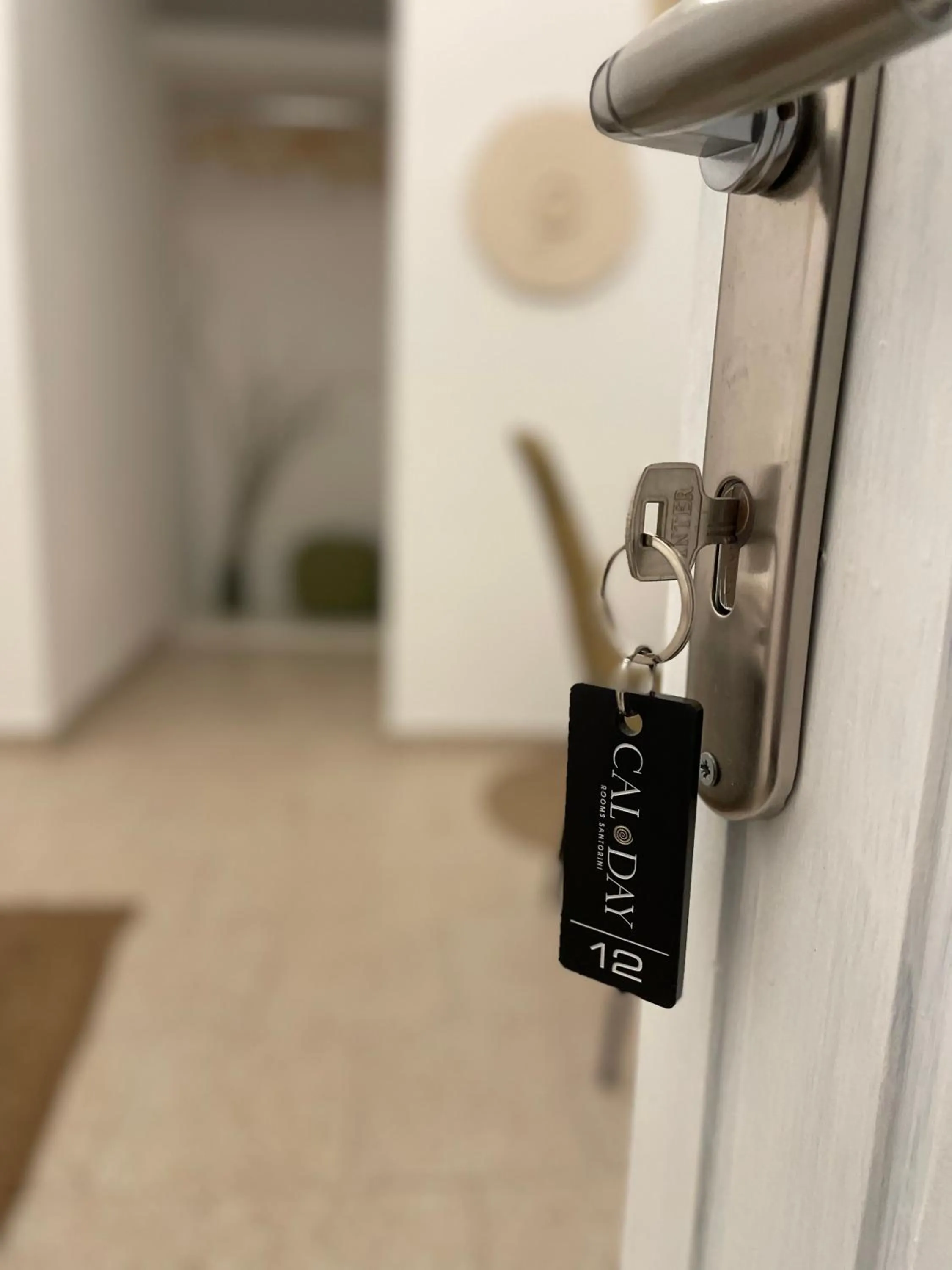 Logo/Certificate/Sign in Cal Day Rooms Santorini