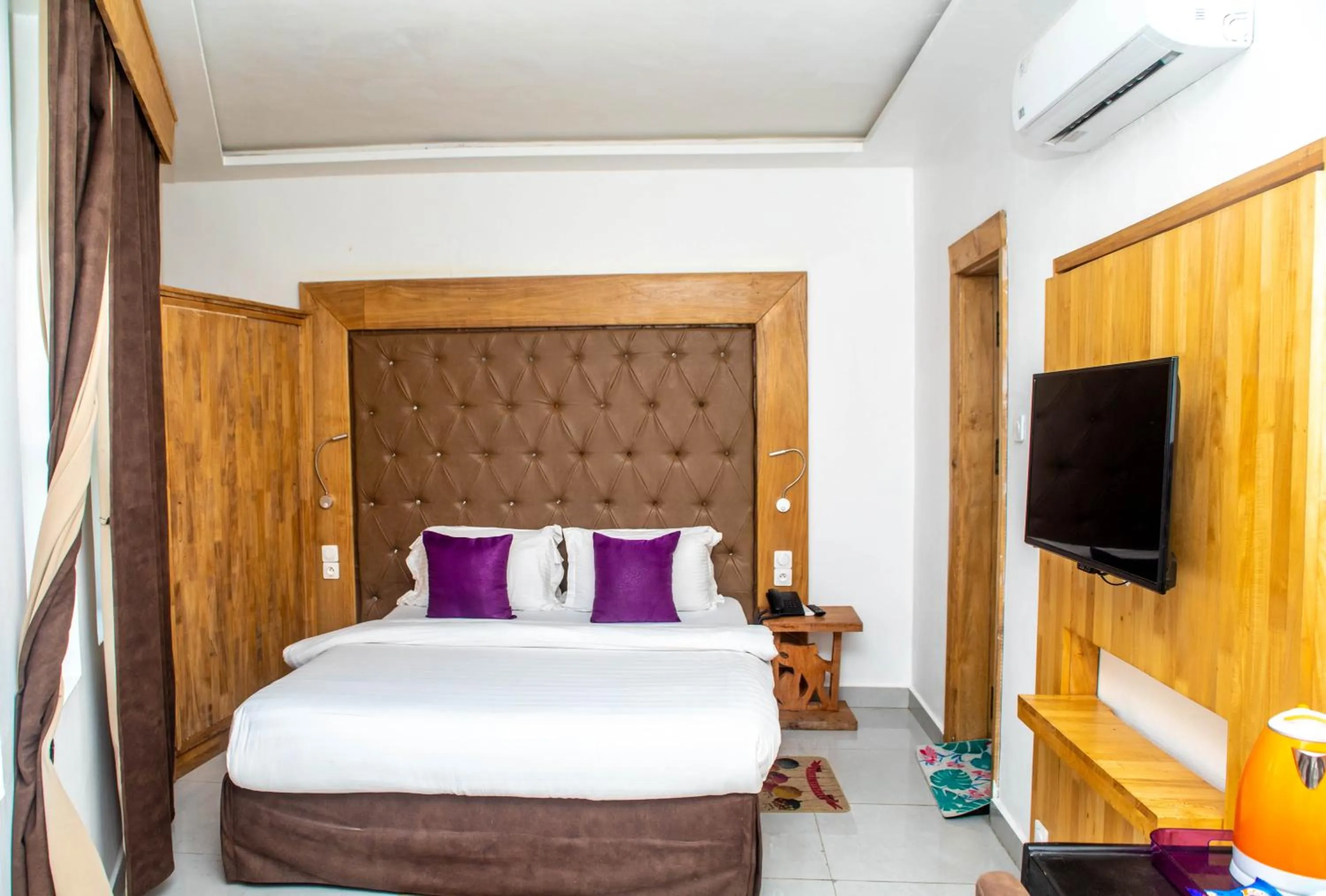 Photo of the whole room, Bed in Hotel Les Orchidées