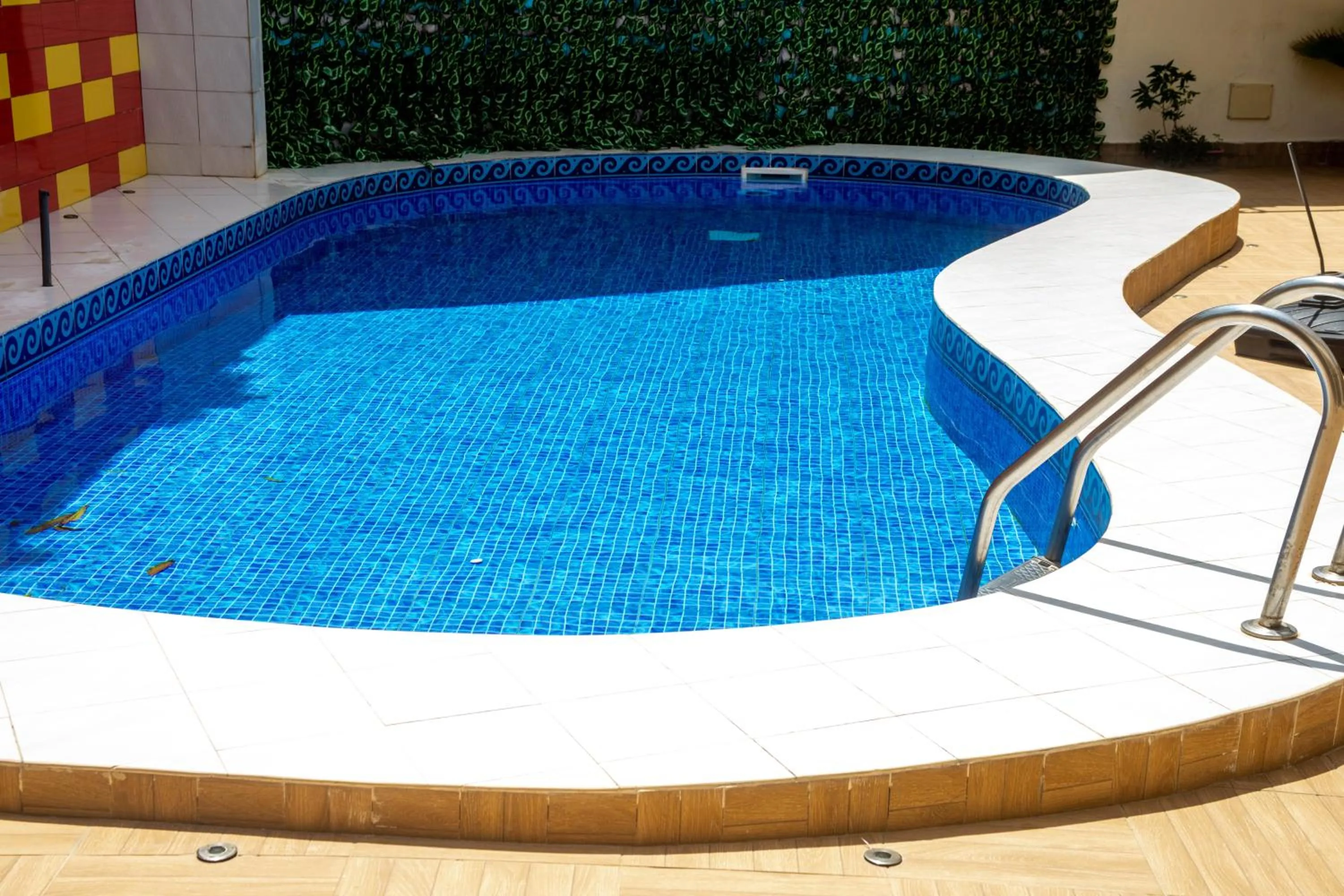 Swimming pool in Hotel Les Orchidées