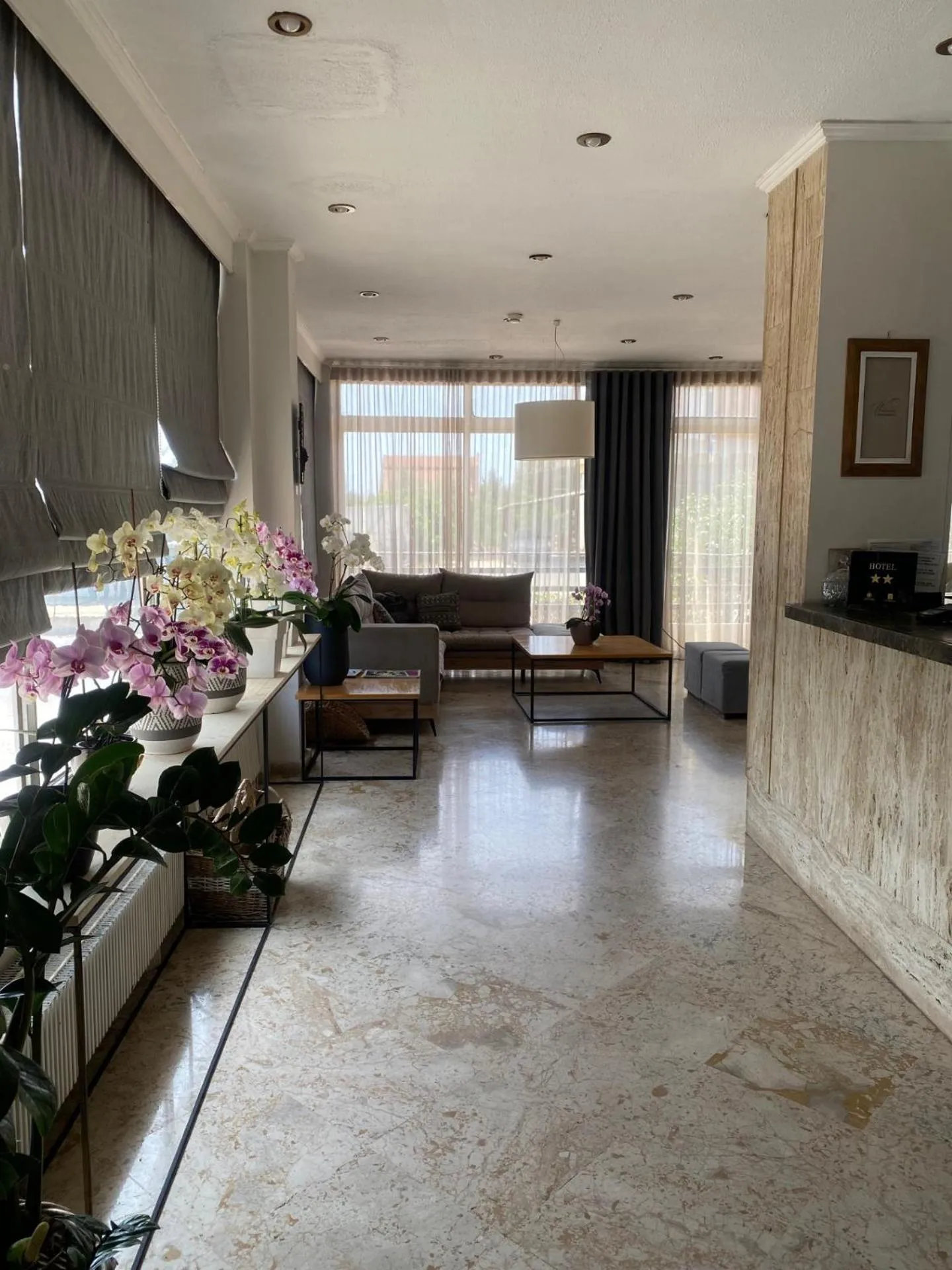 Communal lounge/ TV room in Messini Hotel