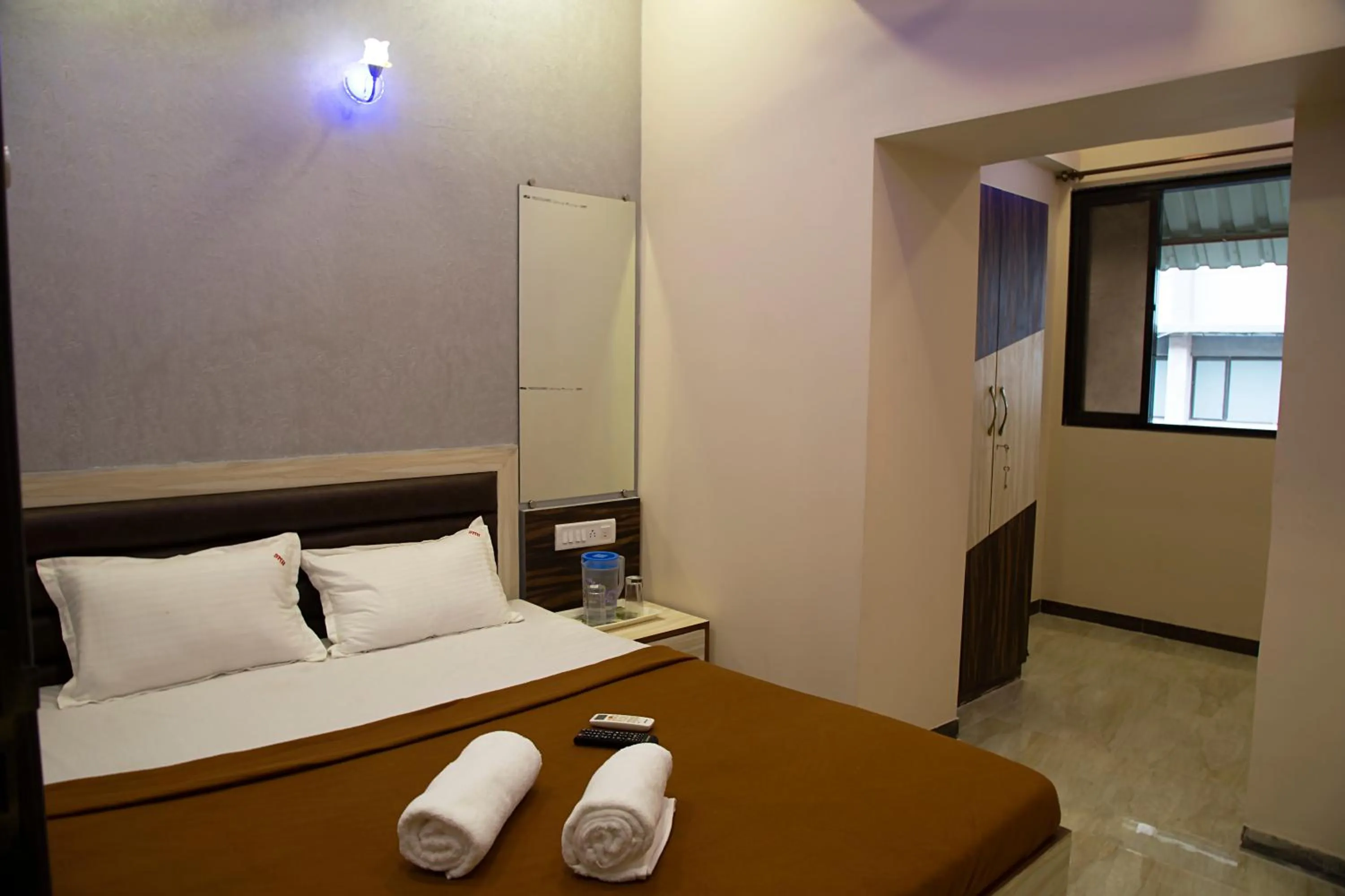 Photo of the whole room, Bed in Welcome Guest House