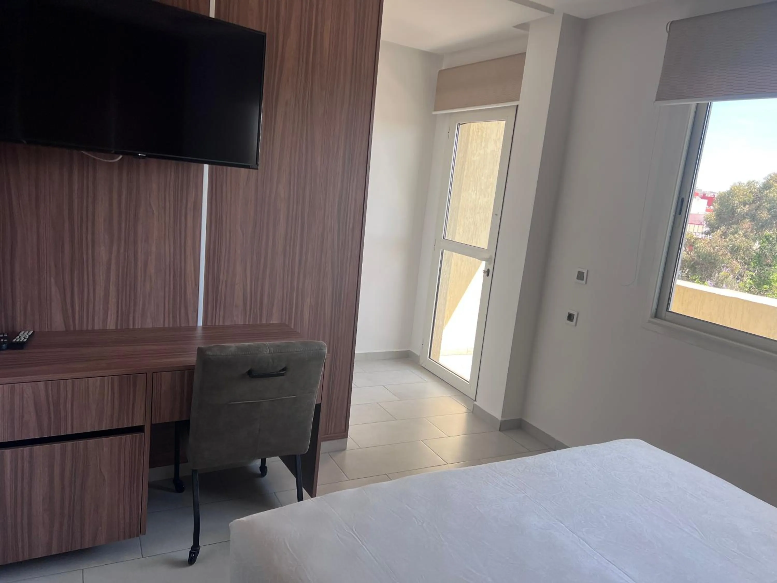 Bed in Appart Hotel Monaco