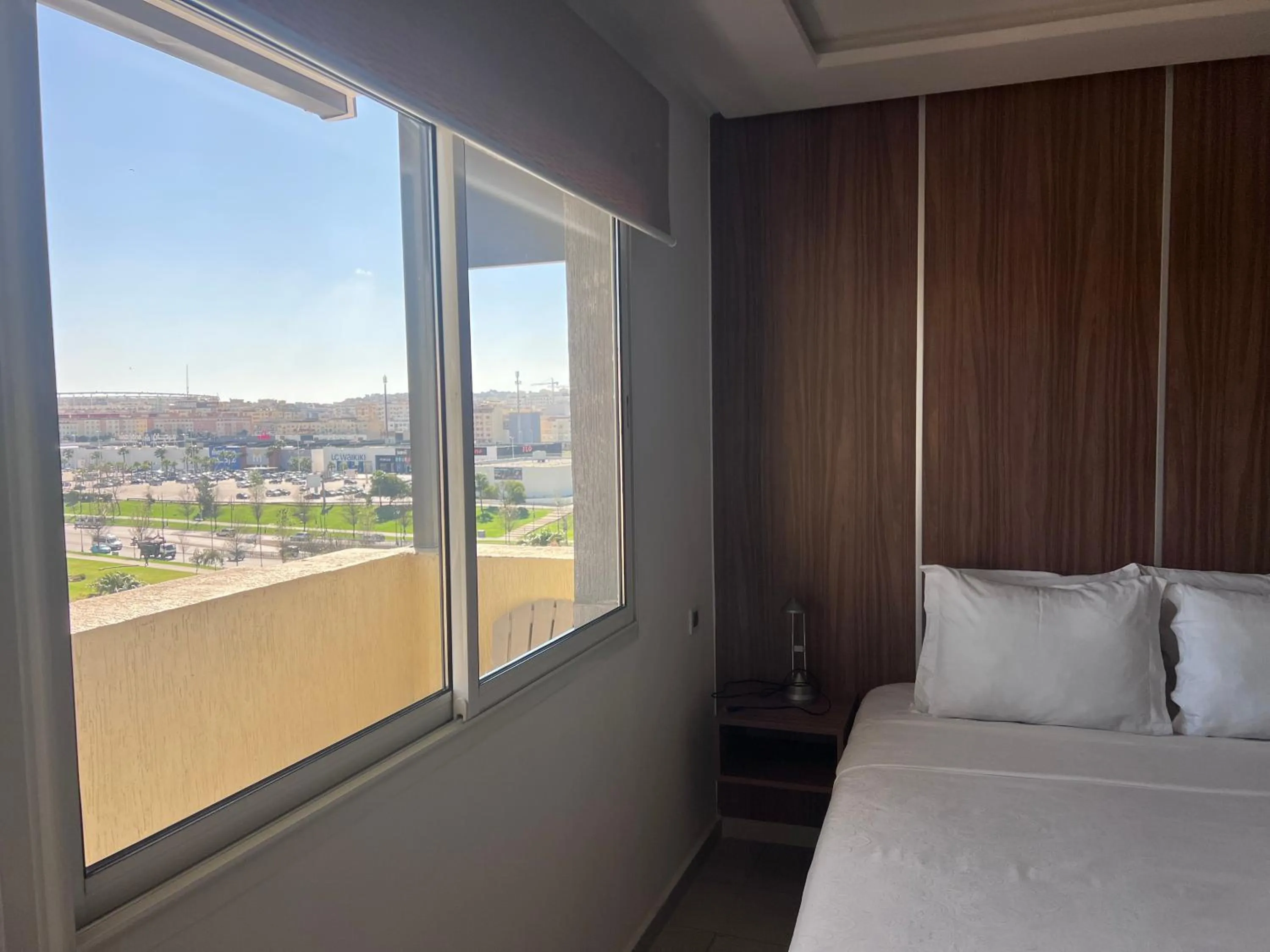 Bed in Appart Hotel Monaco