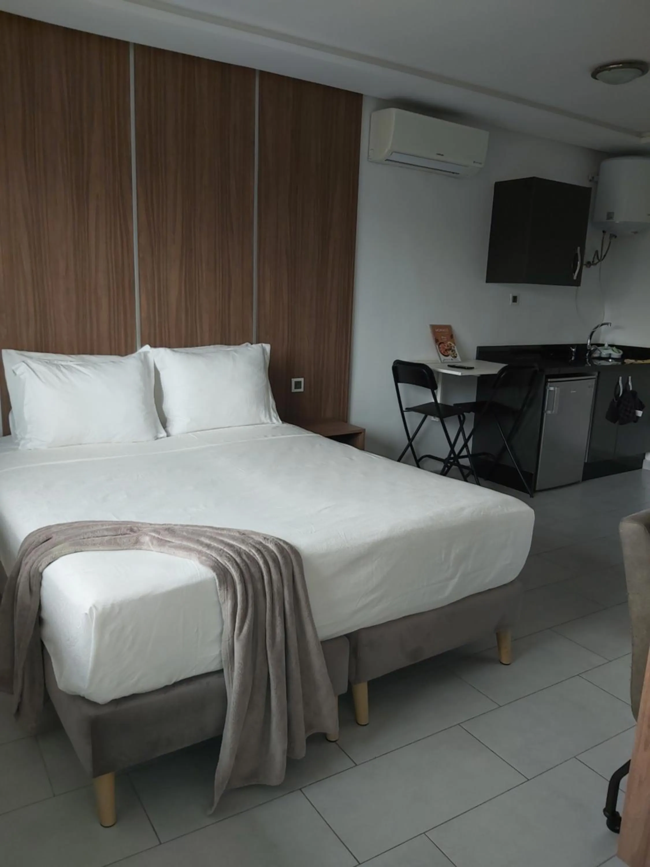 Bed in Appart Hotel Monaco