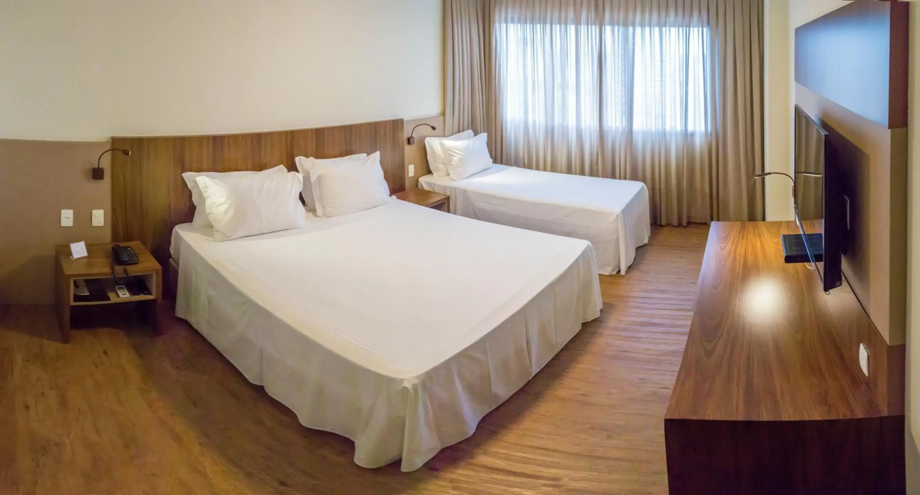 Photo of the whole room, Bed in Gran Executive Hotel Photo of the whole room, Bed in Gran Executive Hotel