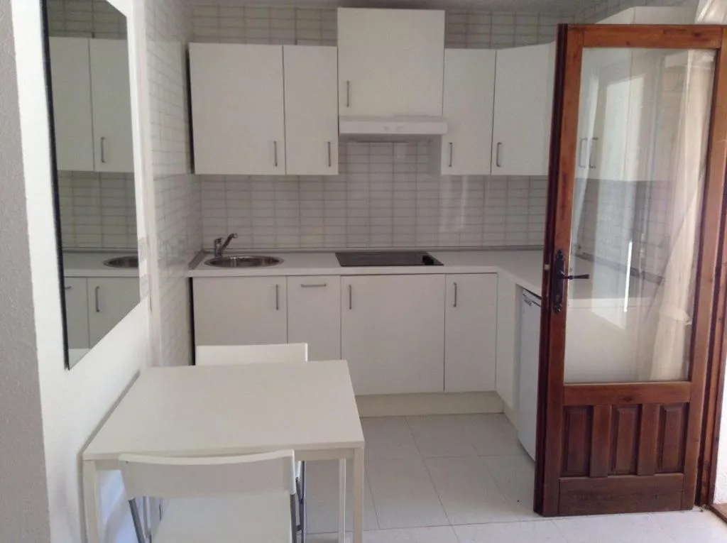 Kitchen or kitchenette in Casa Blanca Suiza