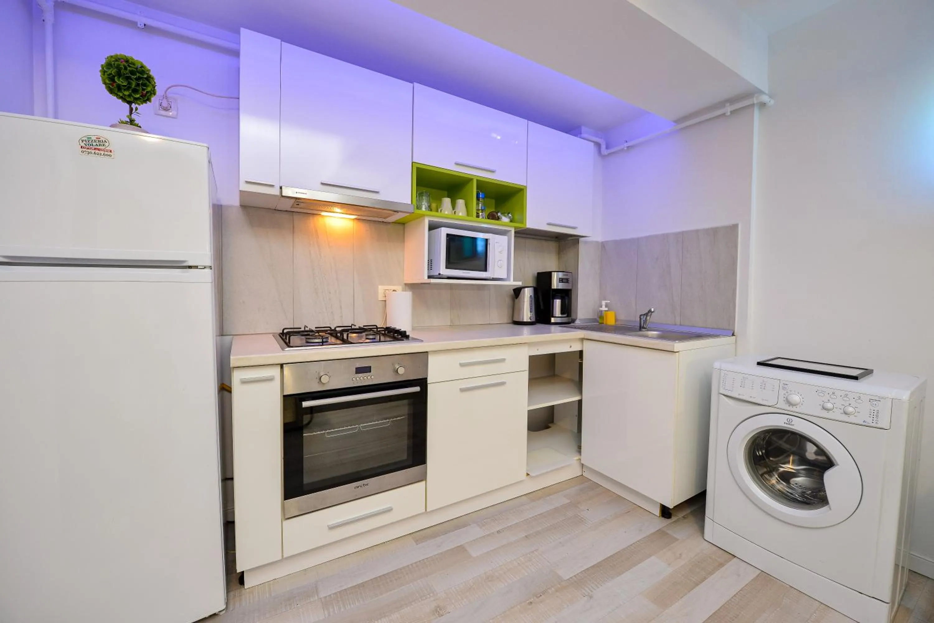 Kitchen or kitchenette in Harmony Suites