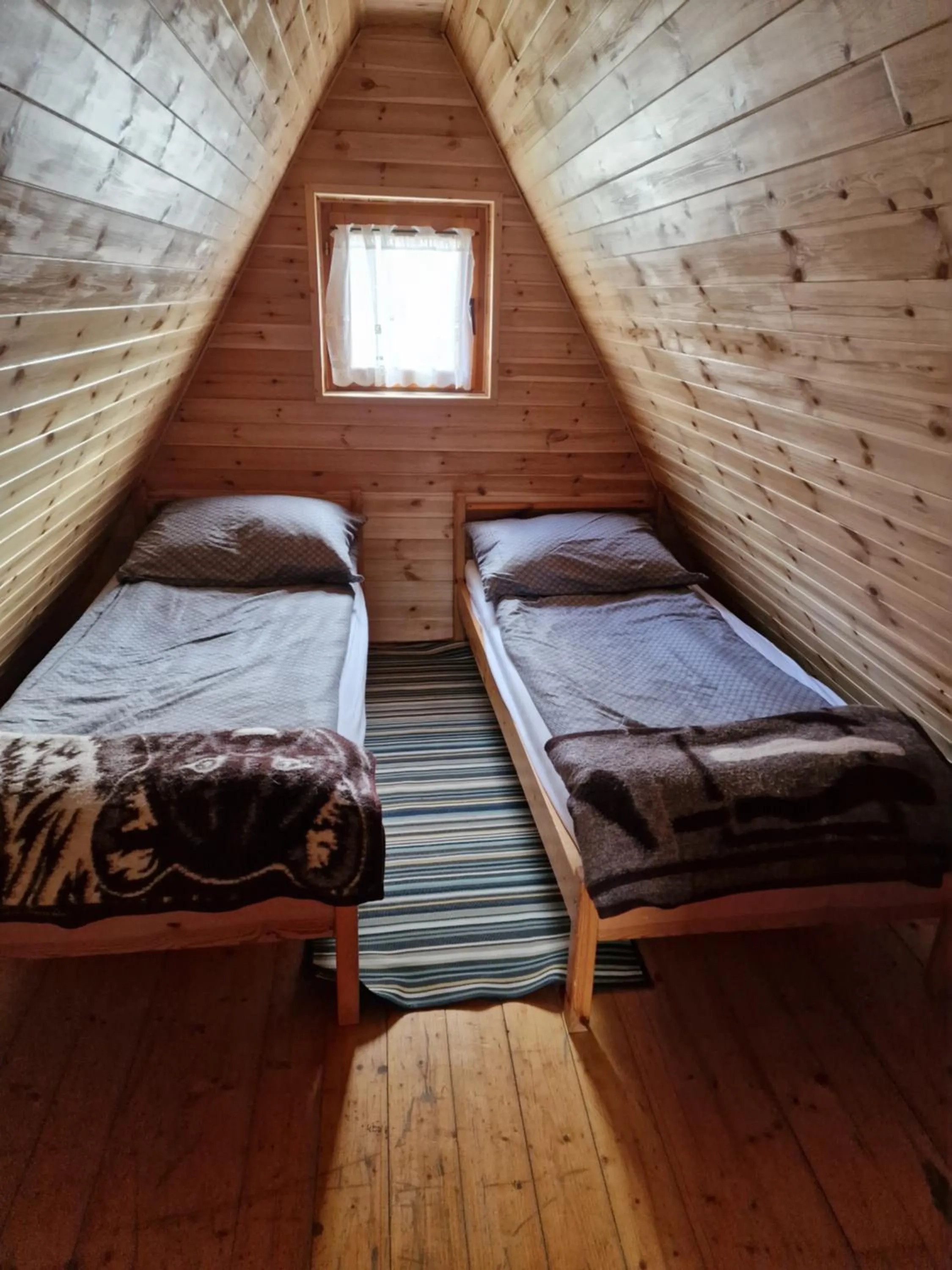 Bed in Pensjonat Gościniec Szczyrk , z sauną i jacuzzi