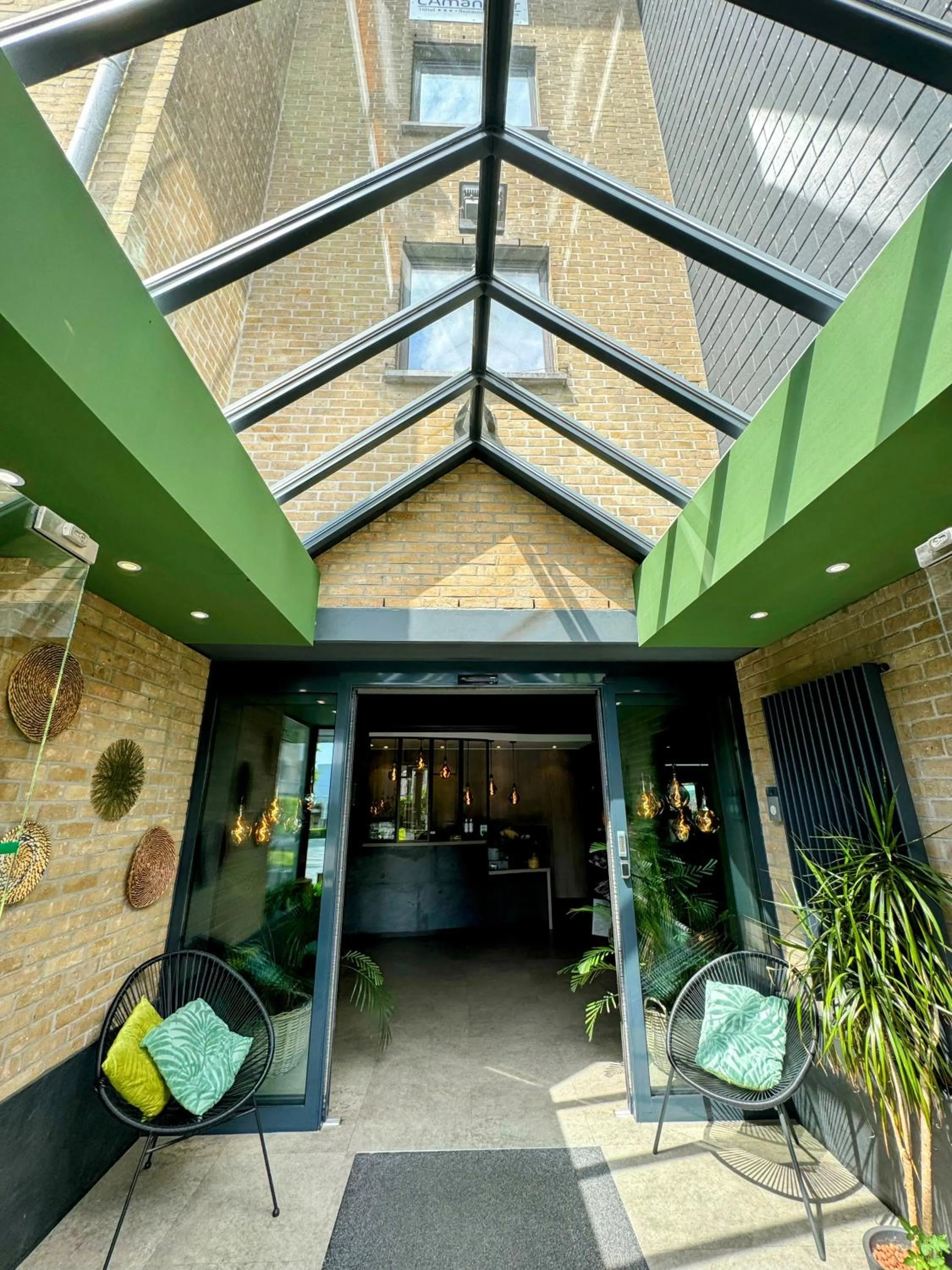 Lobby or reception in Hôtel L'Amandier