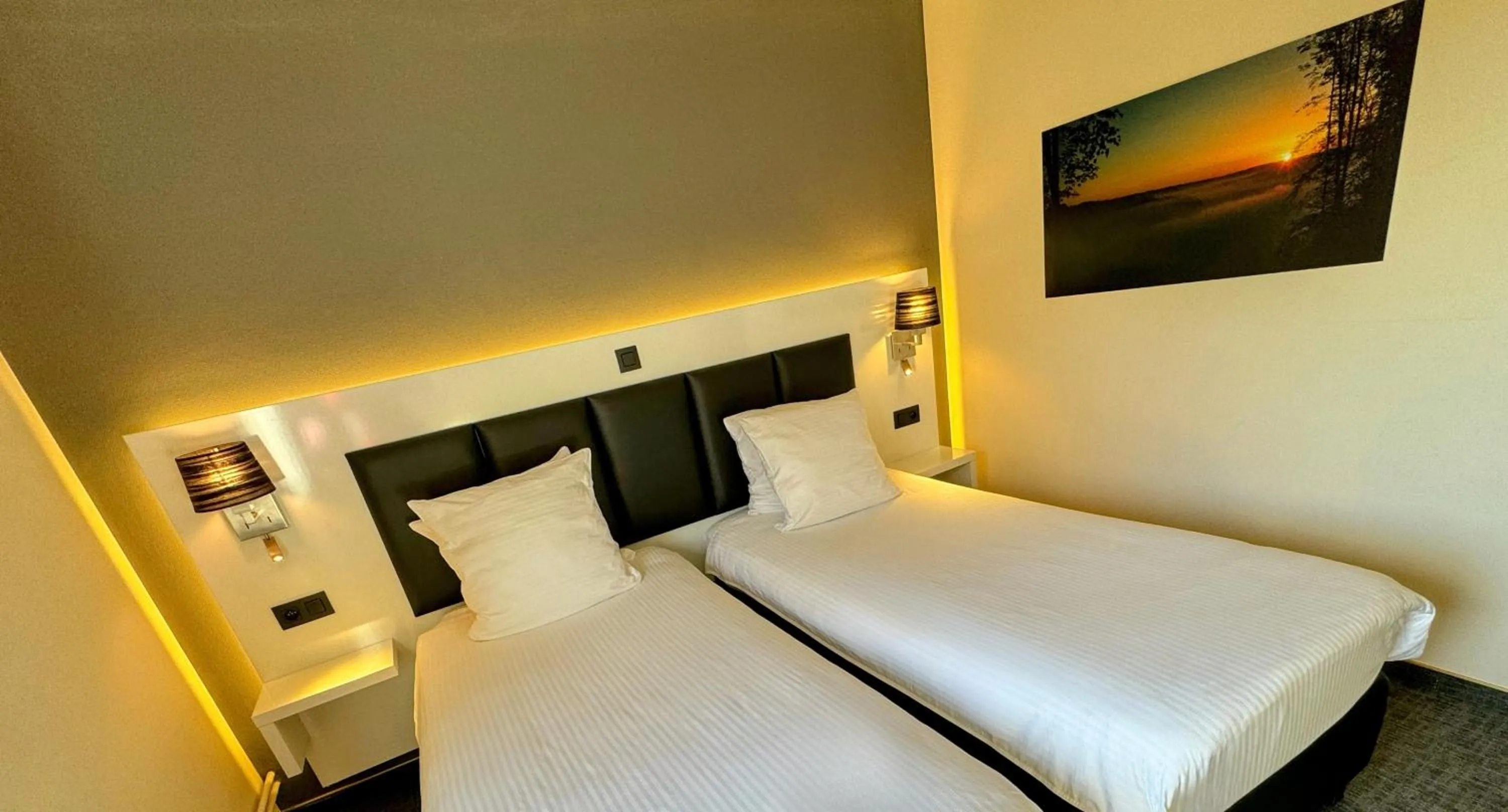 Bed in Hôtel L'Amandier