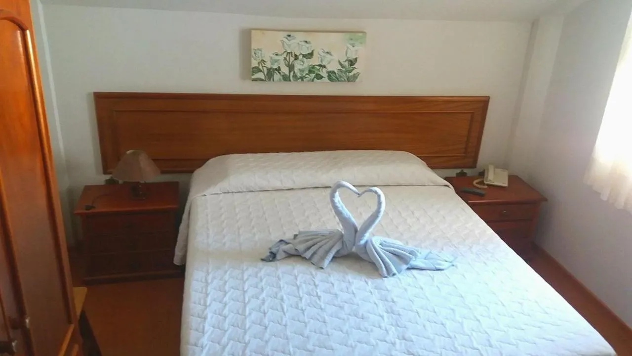 Bed in Pousada Normandy