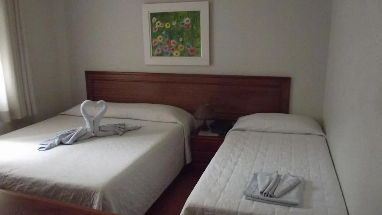 Bed in Pousada Normandy