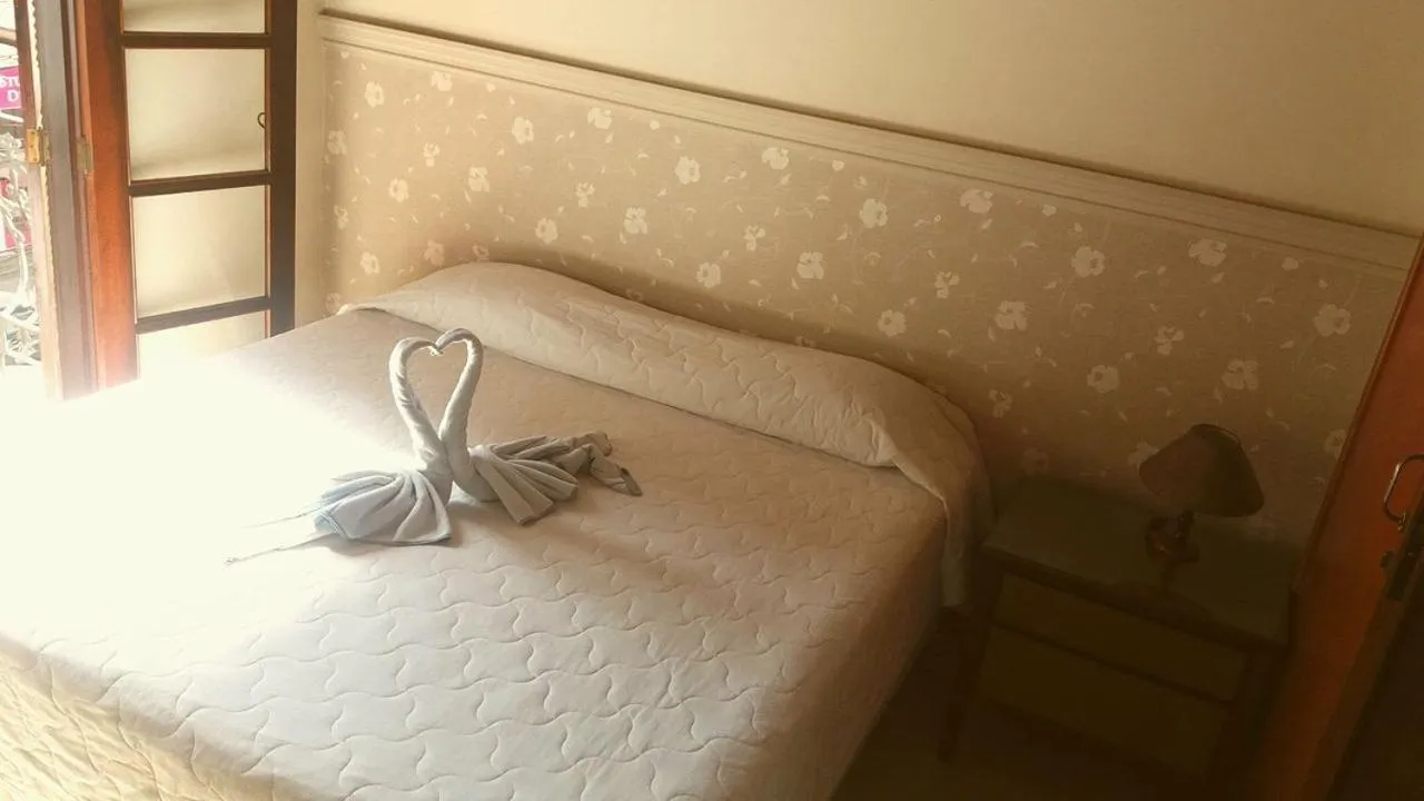 Bed in Pousada Normandy