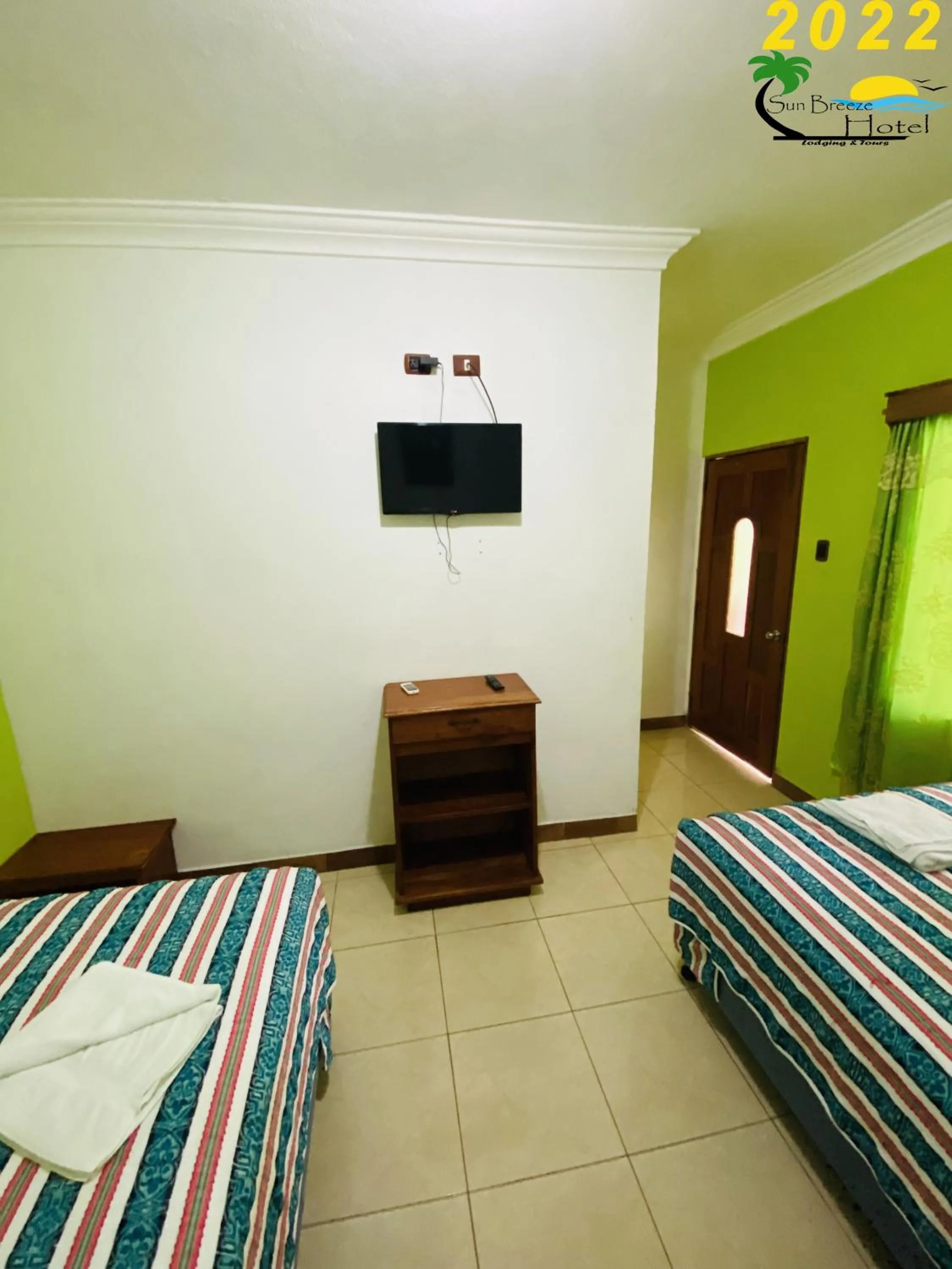 Photo of the whole room, Bed in Sun Breeze Hotel