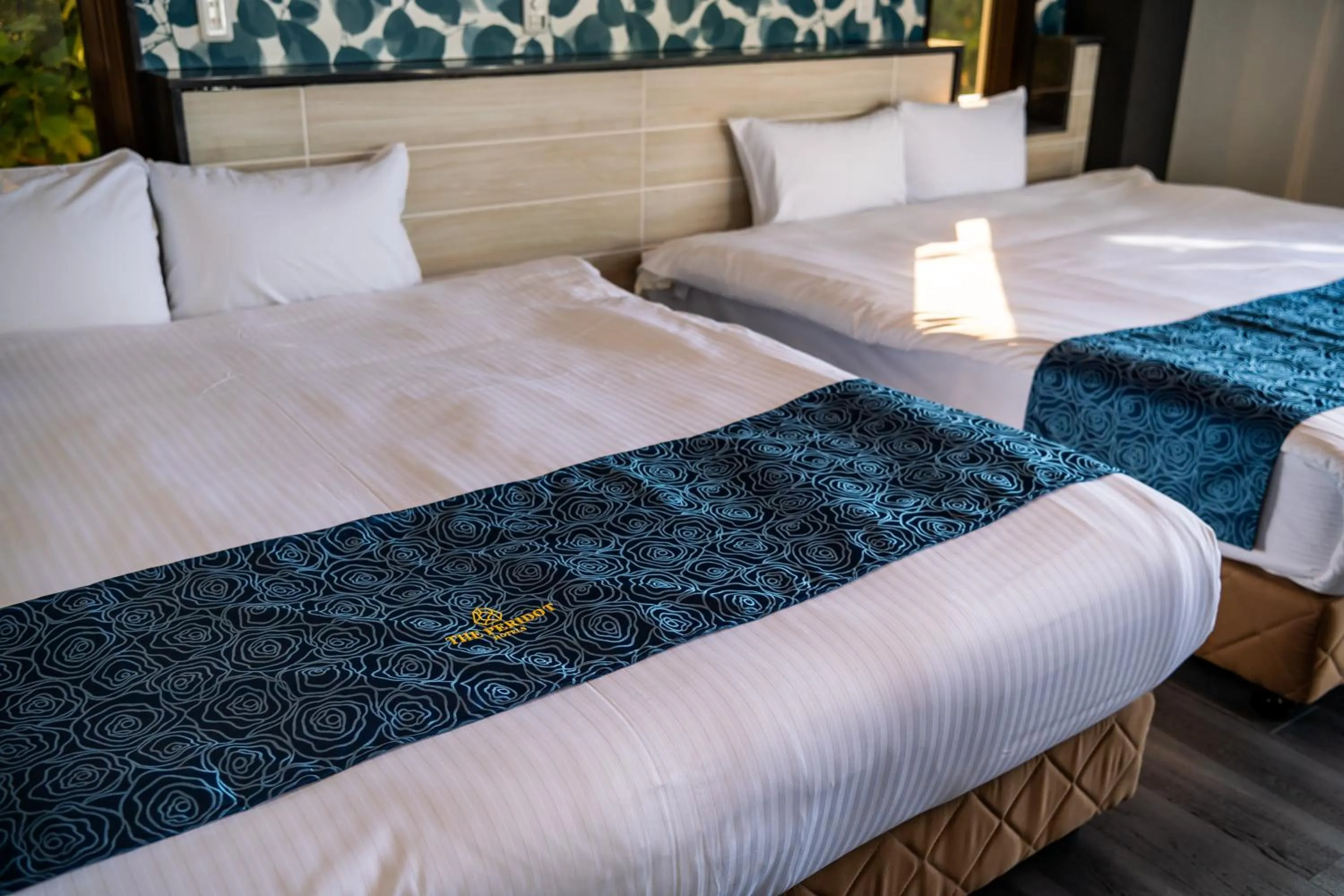 Bed in The Peridot Smart Hotel Tancha Ward