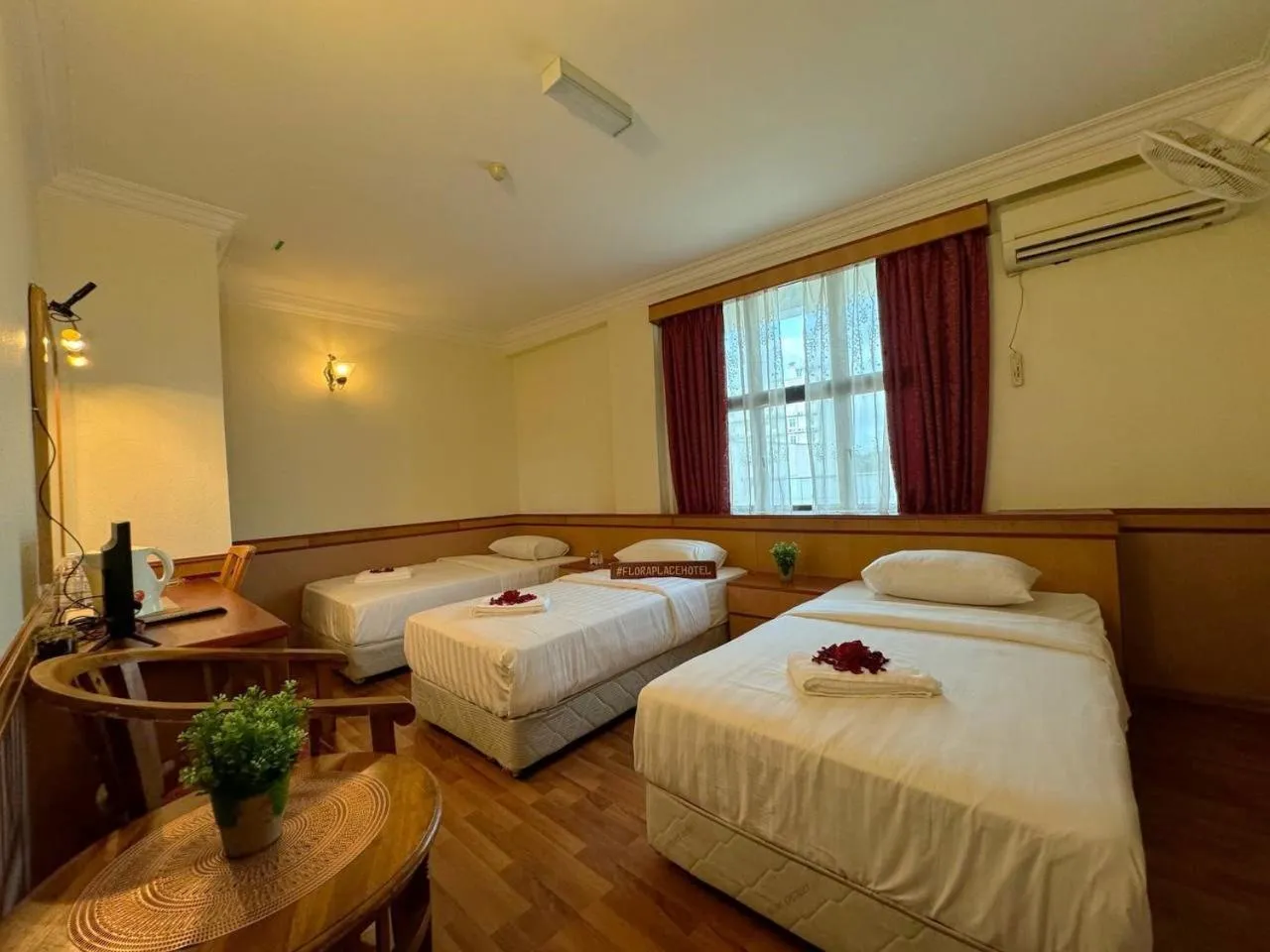 Bed in Flora Place Hotel