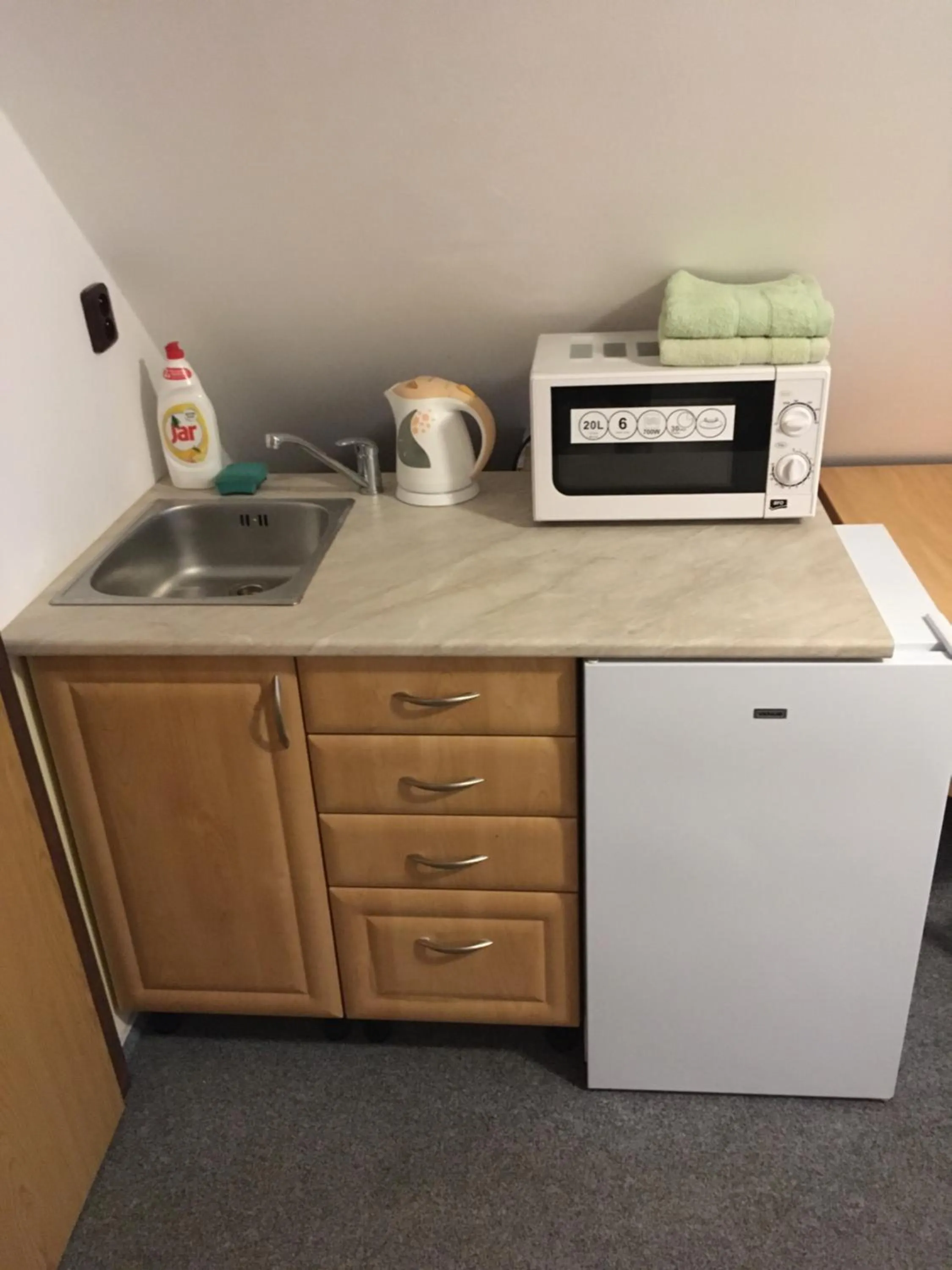Kitchen or kitchenette in Penzion "V Zelený"