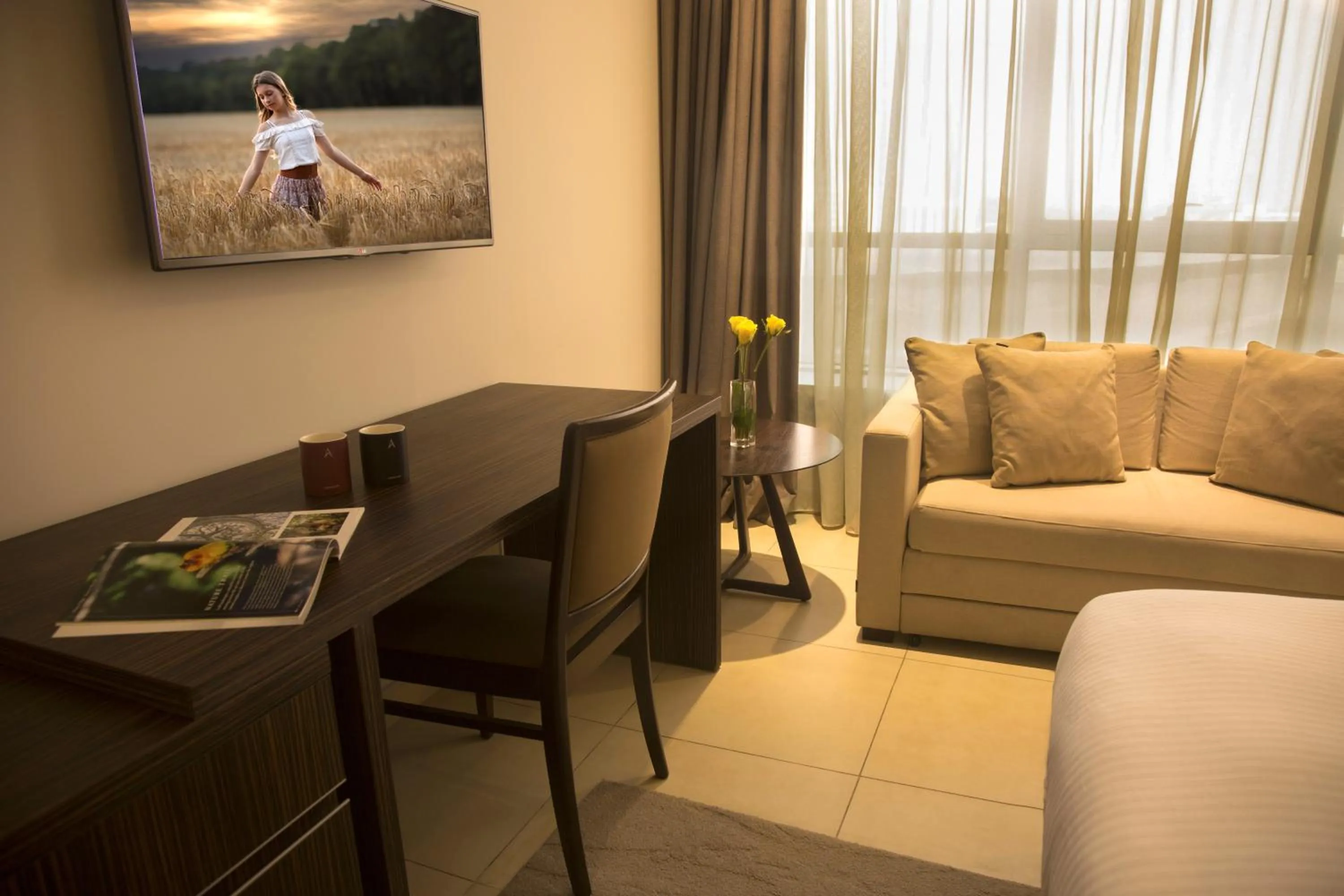 Bedroom in Kin Plaza Arjaan by Rotana