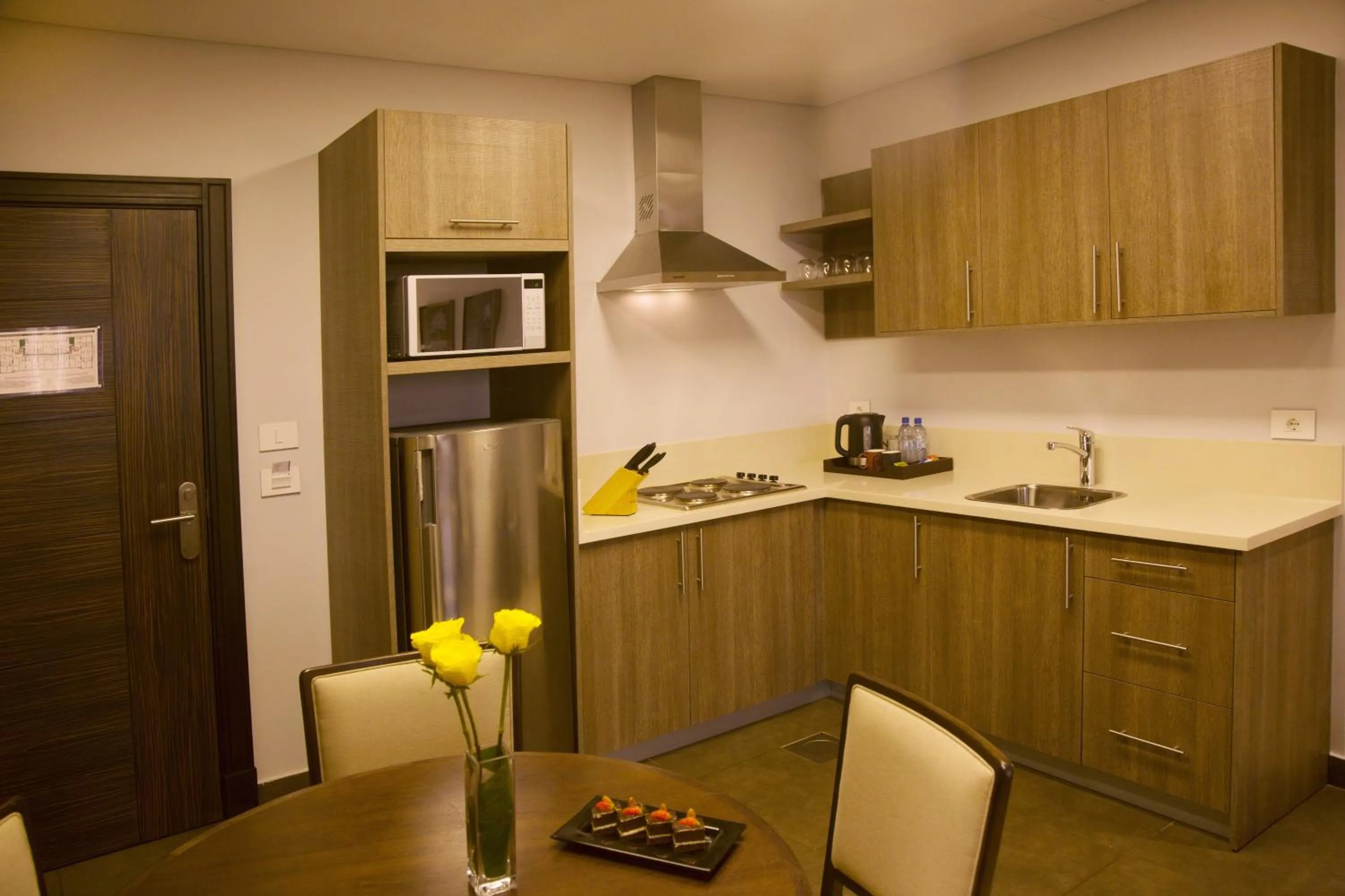 Kitchen or kitchenette in Kin Plaza Arjaan by Rotana