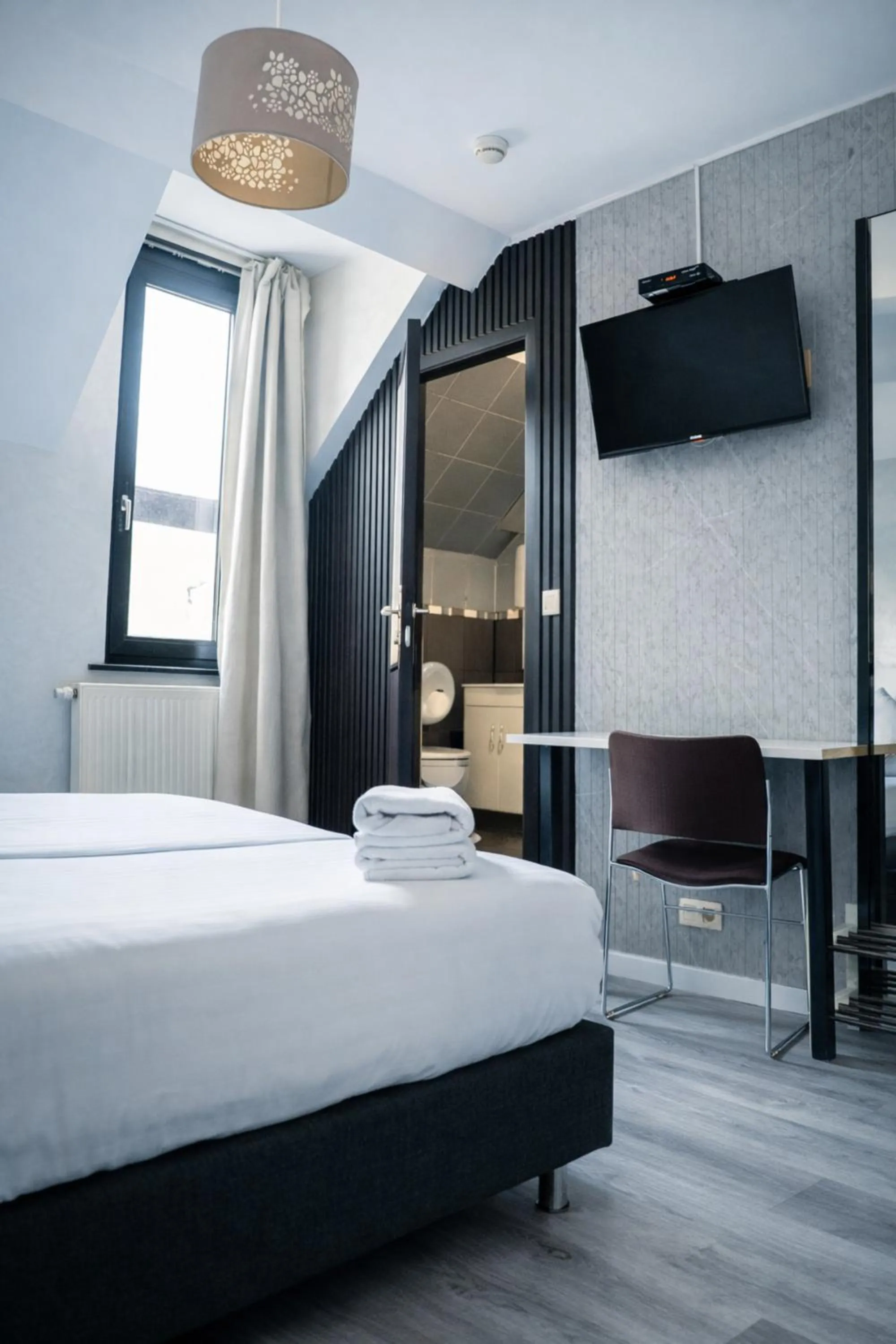 Bed in Hotel Le Centenaire Brussels Expo