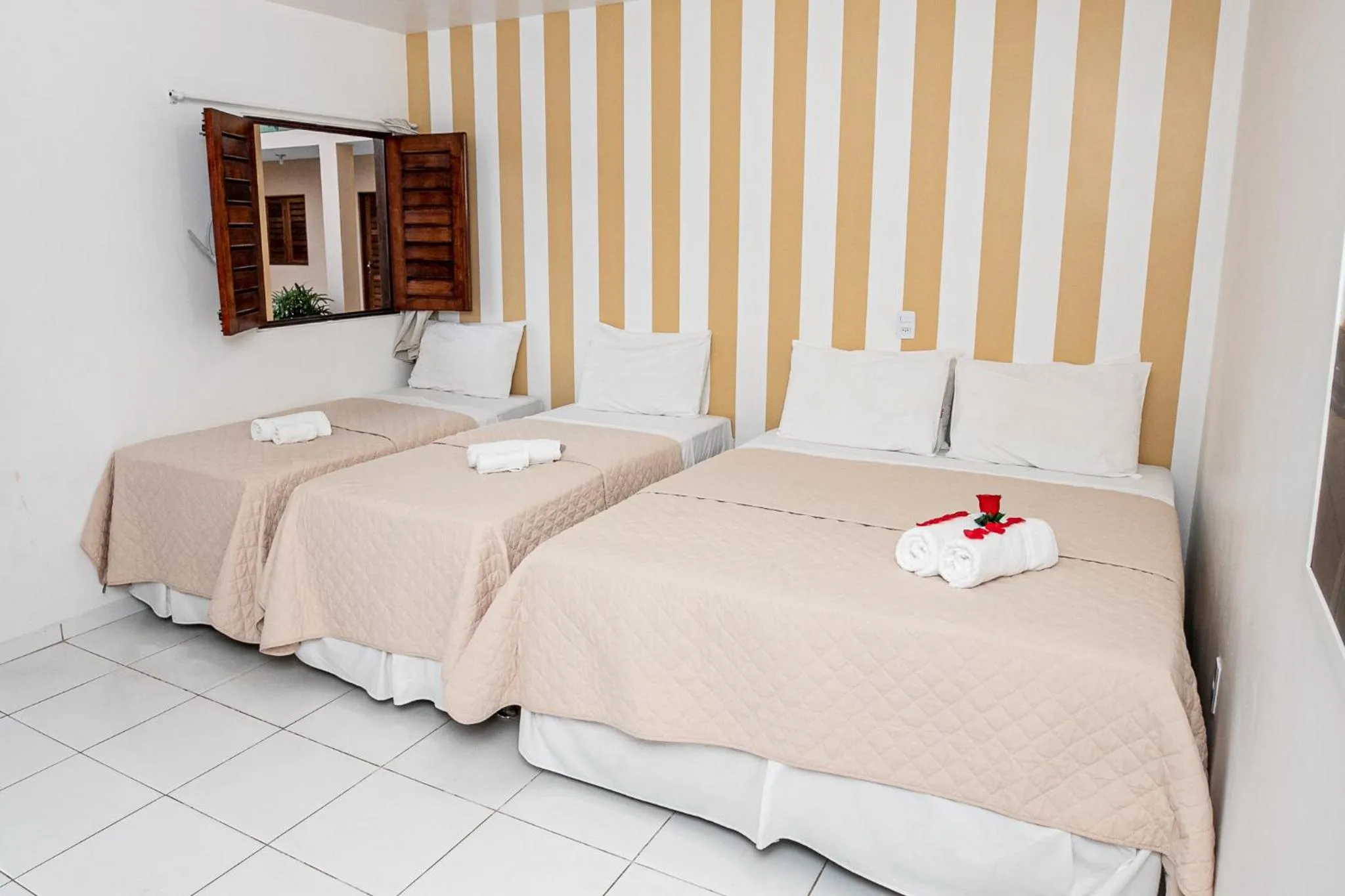 Bed in Pousada Paris