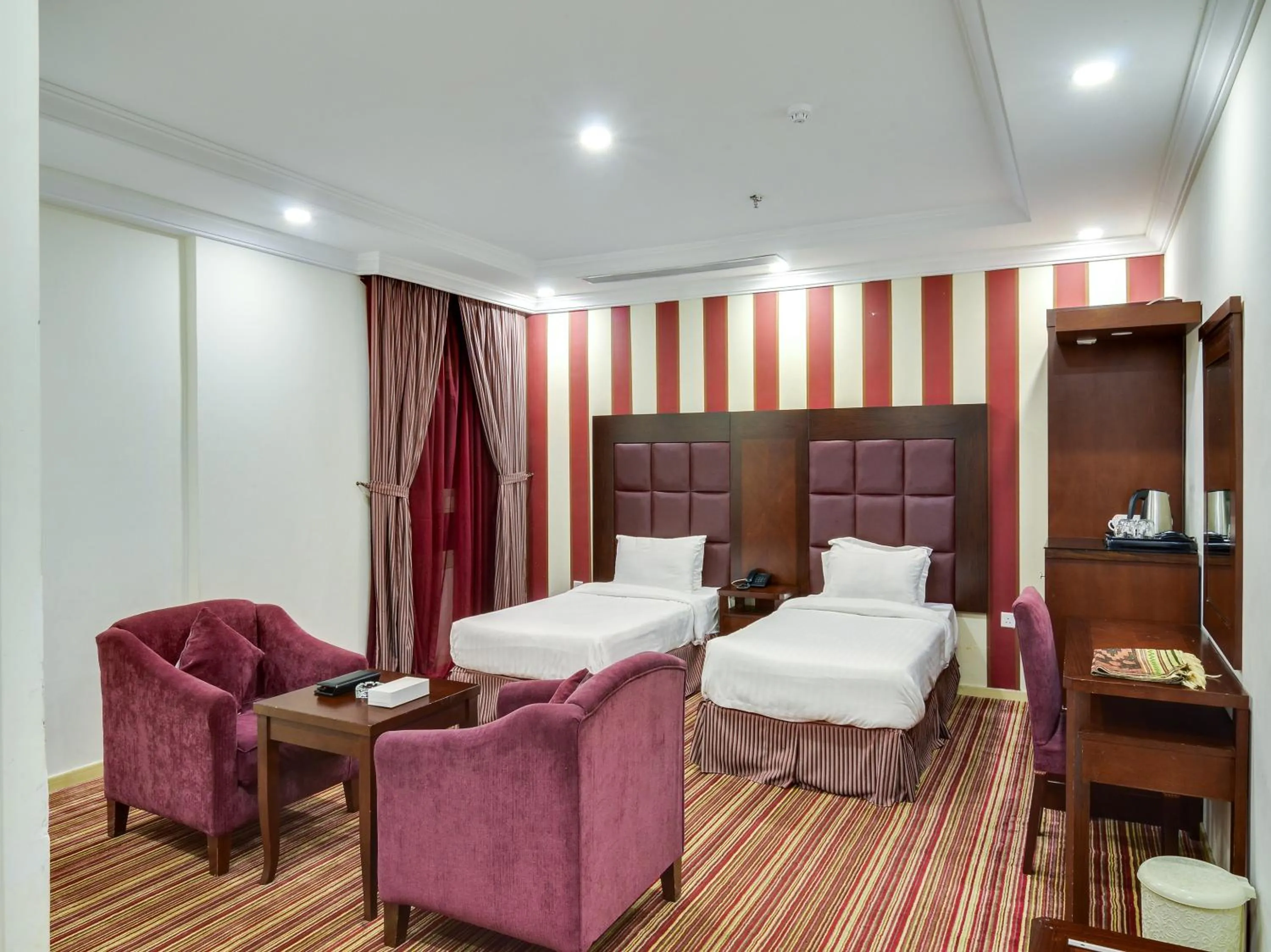 Seating area, Bed in Elaf Suites Al-Andalus