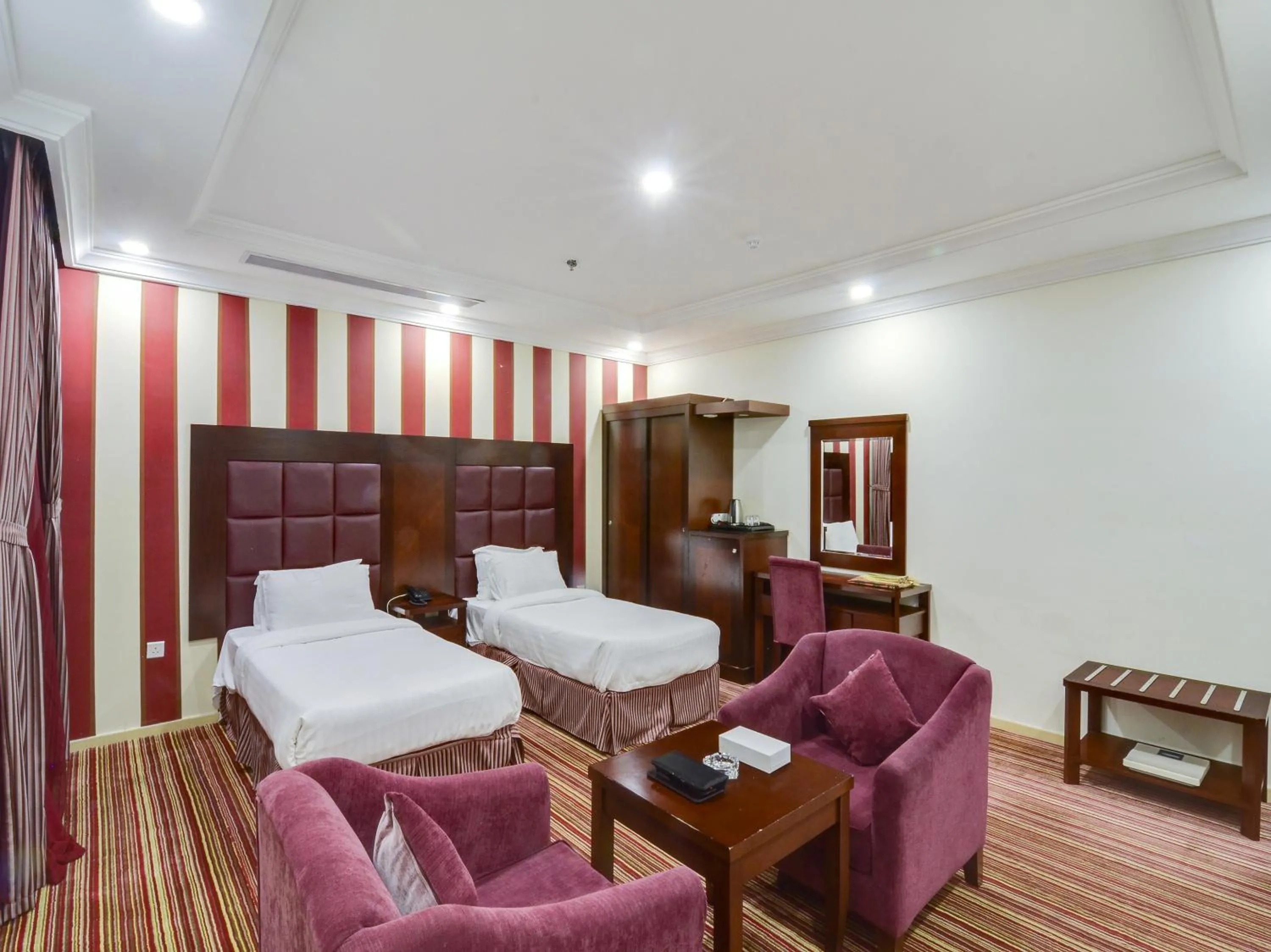 Seating area, Bed in Elaf Suites Al-Andalus